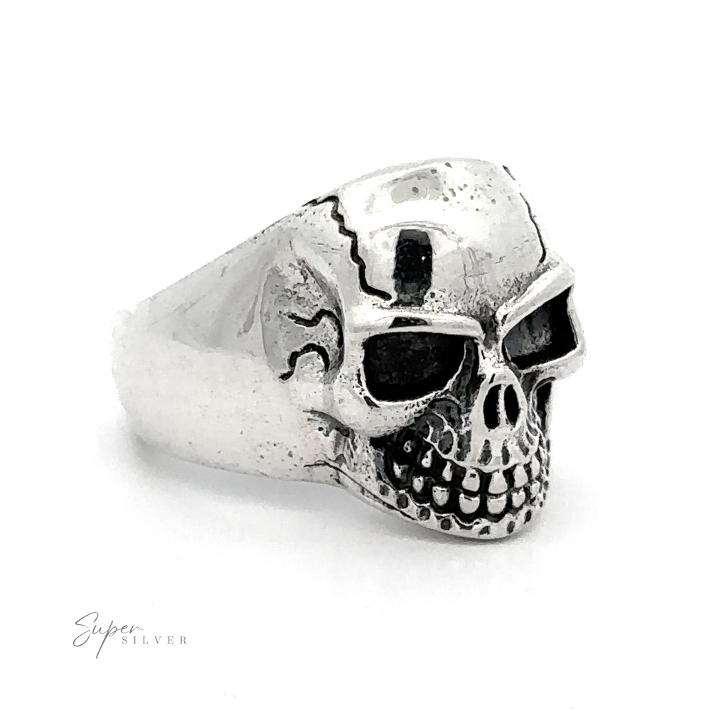 A Detailed Veined Skull Statement Ring featuring intricate details on a white background. The brand name "Super Silver" is visible in the bottom left corner, making it a bold accessory for any collection.