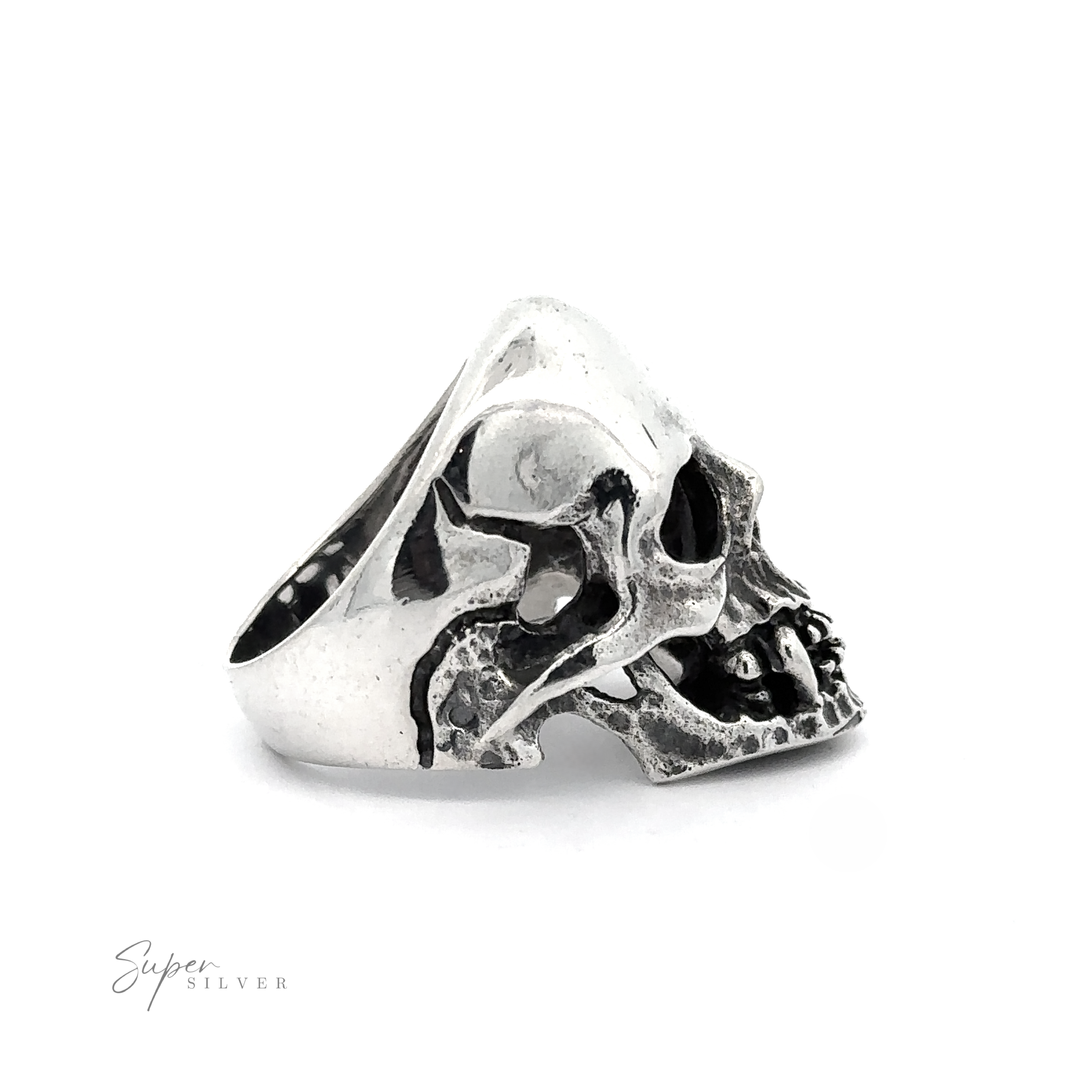 This Large Fanged Skull Statement Ring shaped like a skull with hollow eyes and an open mouth perfectly captures the gothic aesthetic.
