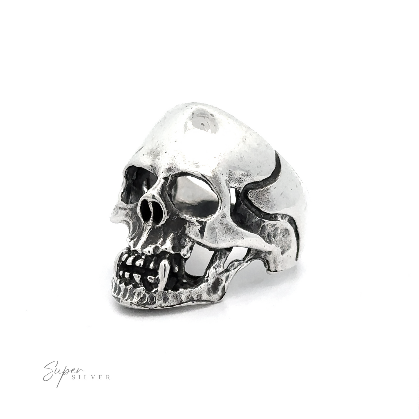 A Large Fanged Skull Statement Ring with a partially open mouth is displayed against a white background. The words "Super Silver" appear in the bottom left corner, adding to its gothic aesthetic.