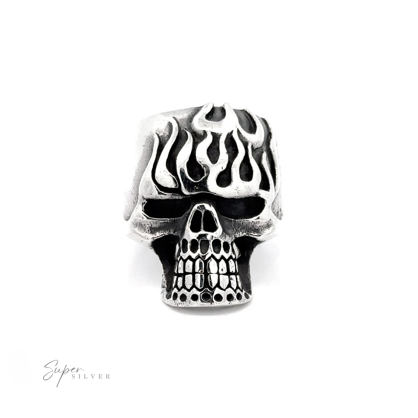 A Flaming Skull Statement Ring shaped like a skull with flame details on the forehead. Super Silver logo in the bottom left corner.