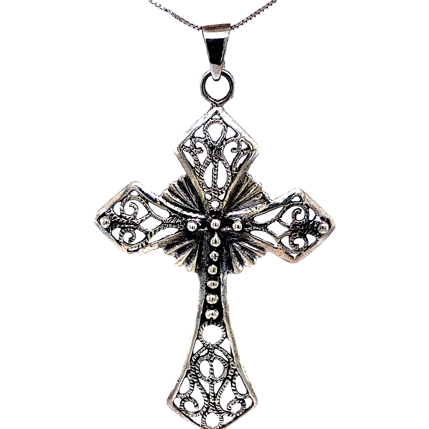 
                  
                    A unique piece of silverwork, a Super Silver Ornate Cross Pendant, on a white background.
                  
                