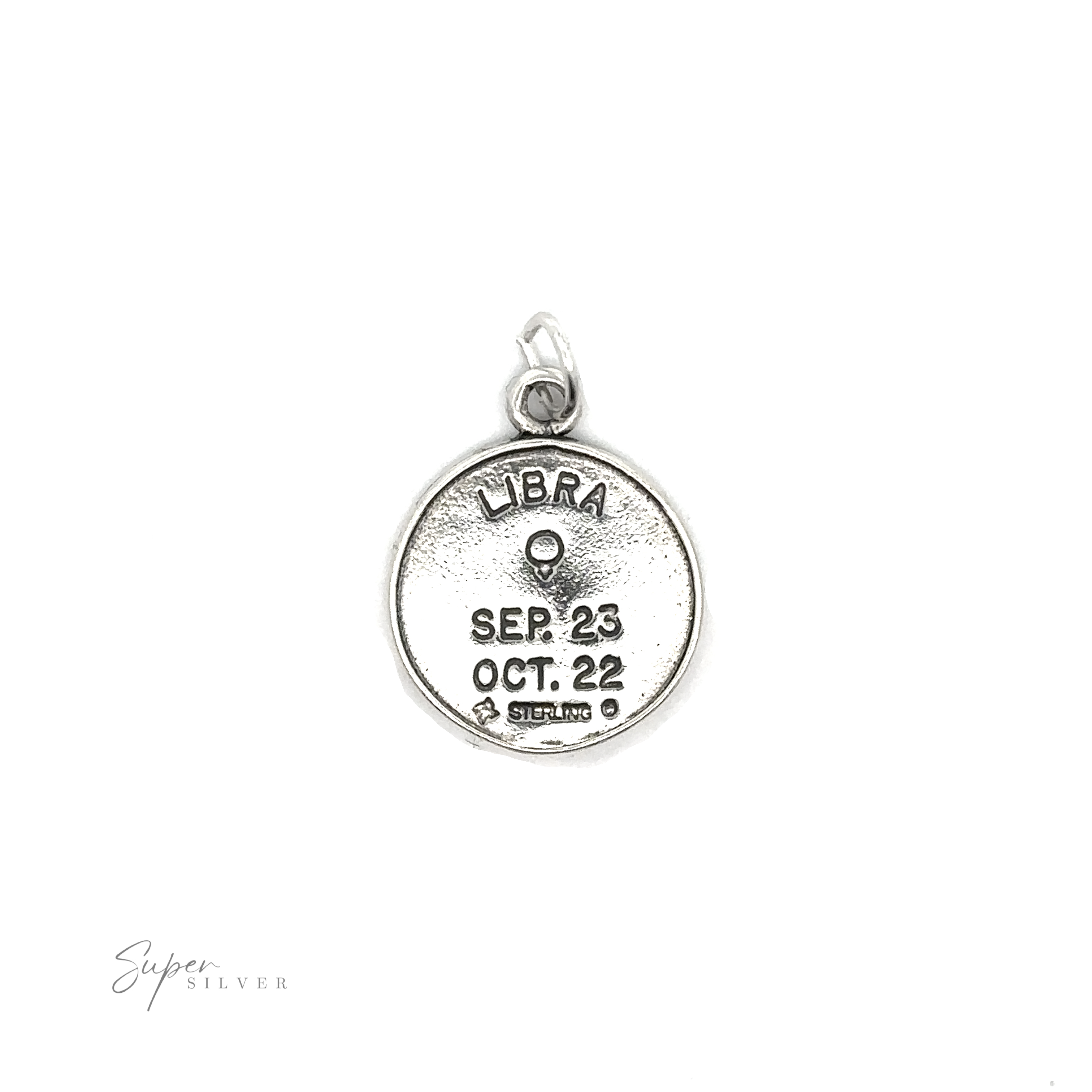 A sterling silver Zodiac Sign Medallion Charms with the dates Sep 23 - Oct 22 engraved on it.
