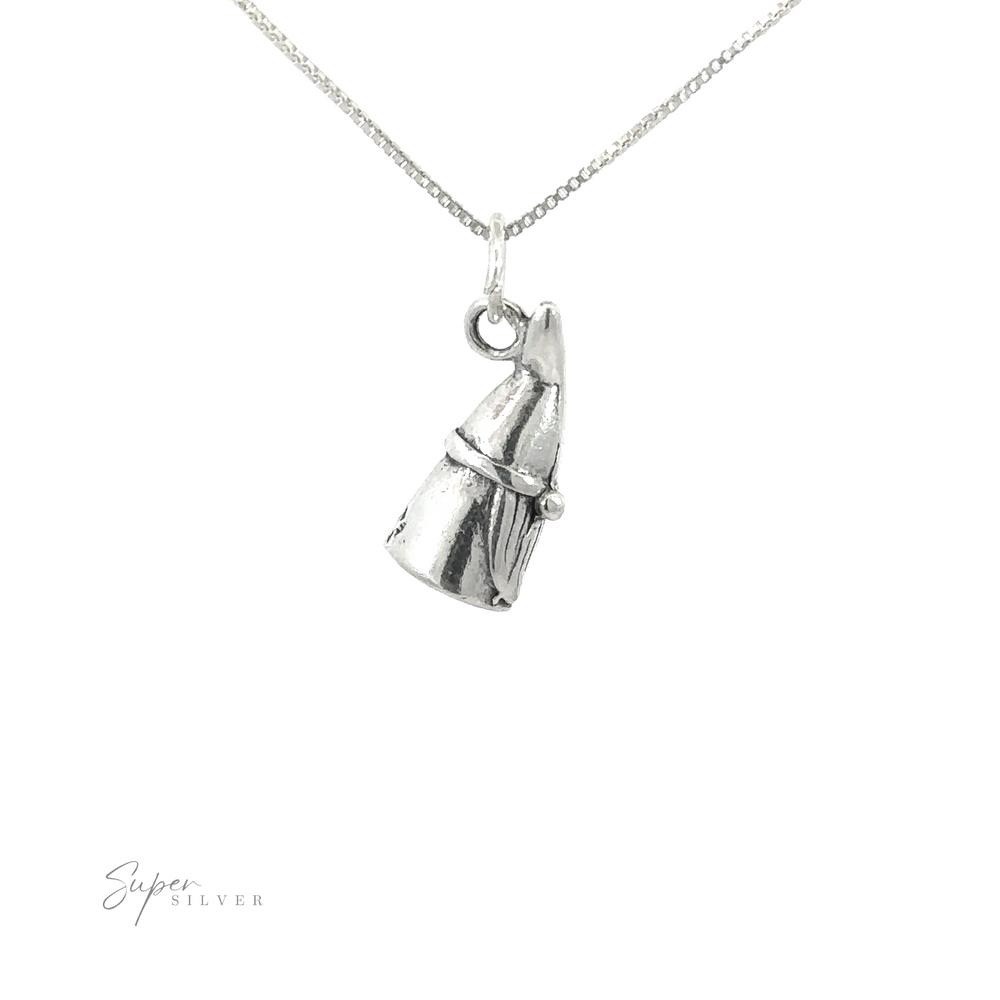 A silver necklace with the Gnome Charm pendant on it.