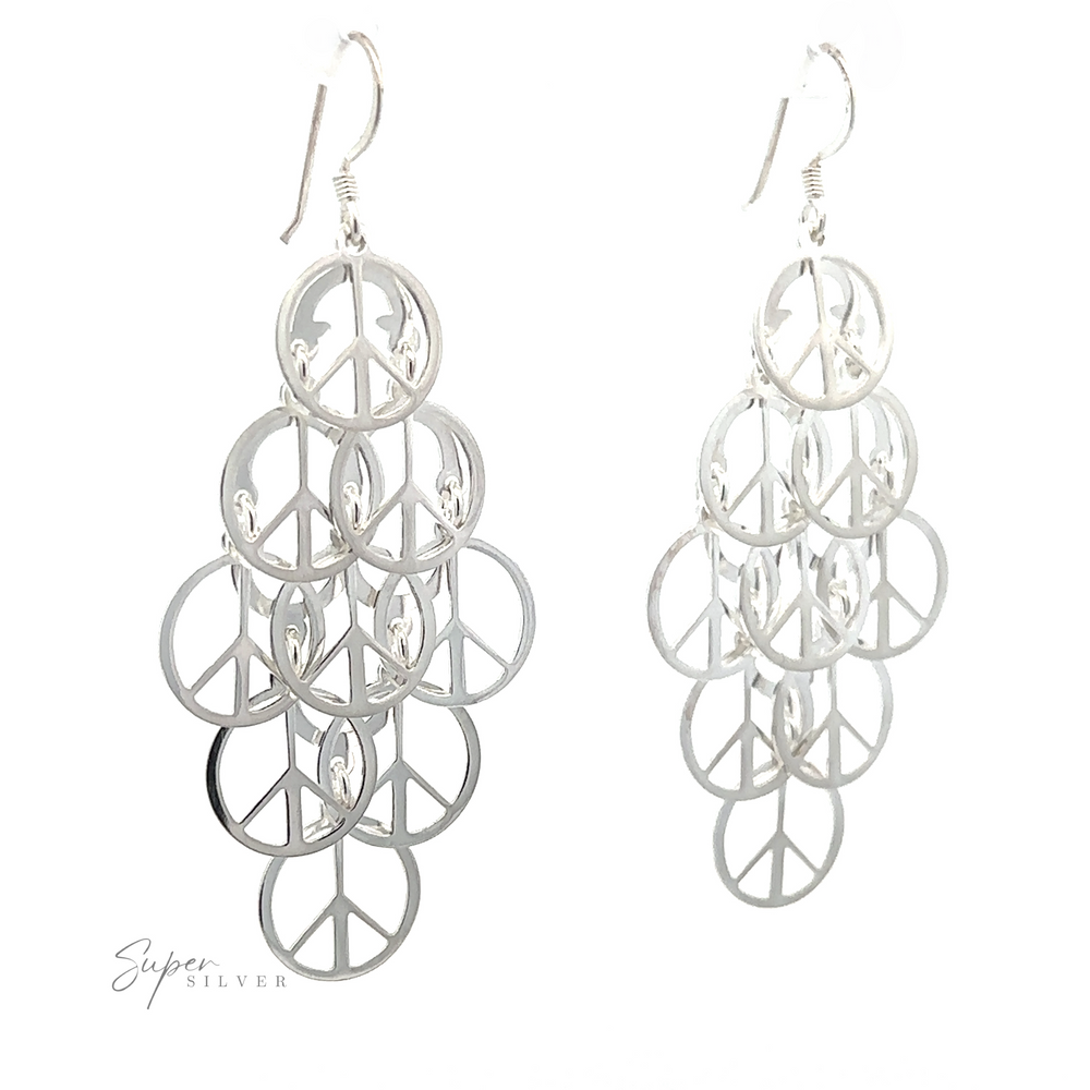 
                  
                    Layered Peace Sign Earrings with multiple overlapping circular designs, suspended from hook-style ear wires, isolated on a white background.
                  
                