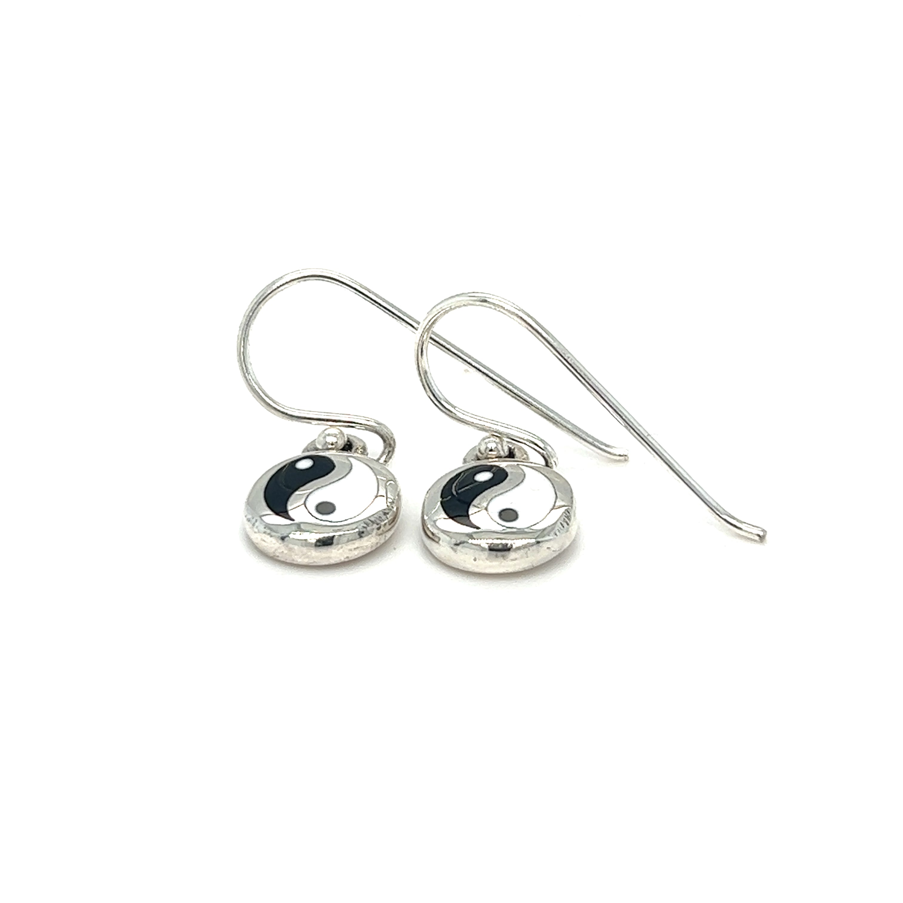 A pair of dainty Round Yin-Yang Dangle Earrings with sterling silver hooks.