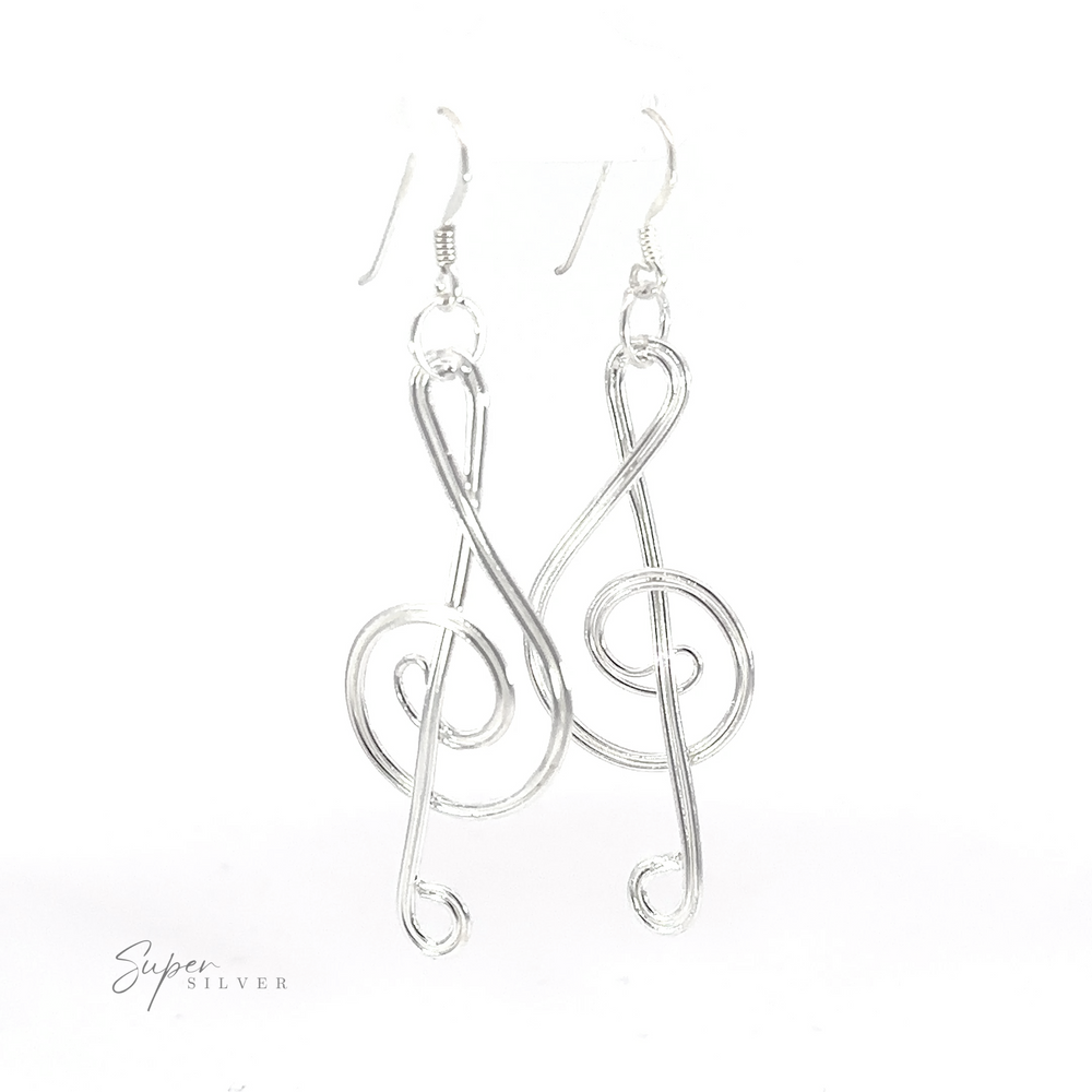 
                  
                    Wire treble clef earrings, perfect for music lovers.
                  
                