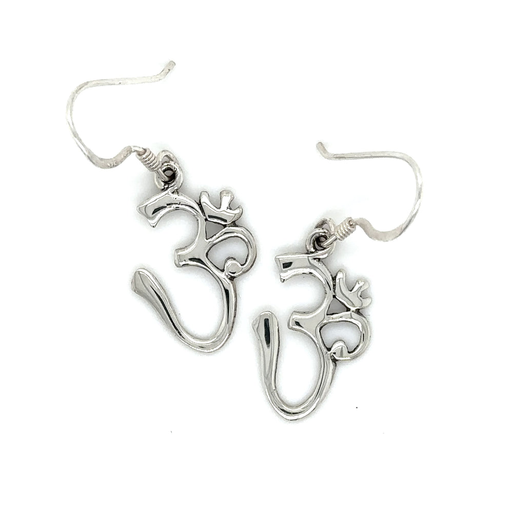 
                  
                    These Super Silver Simple Om Earrings feature an om symbol.
                  
                
