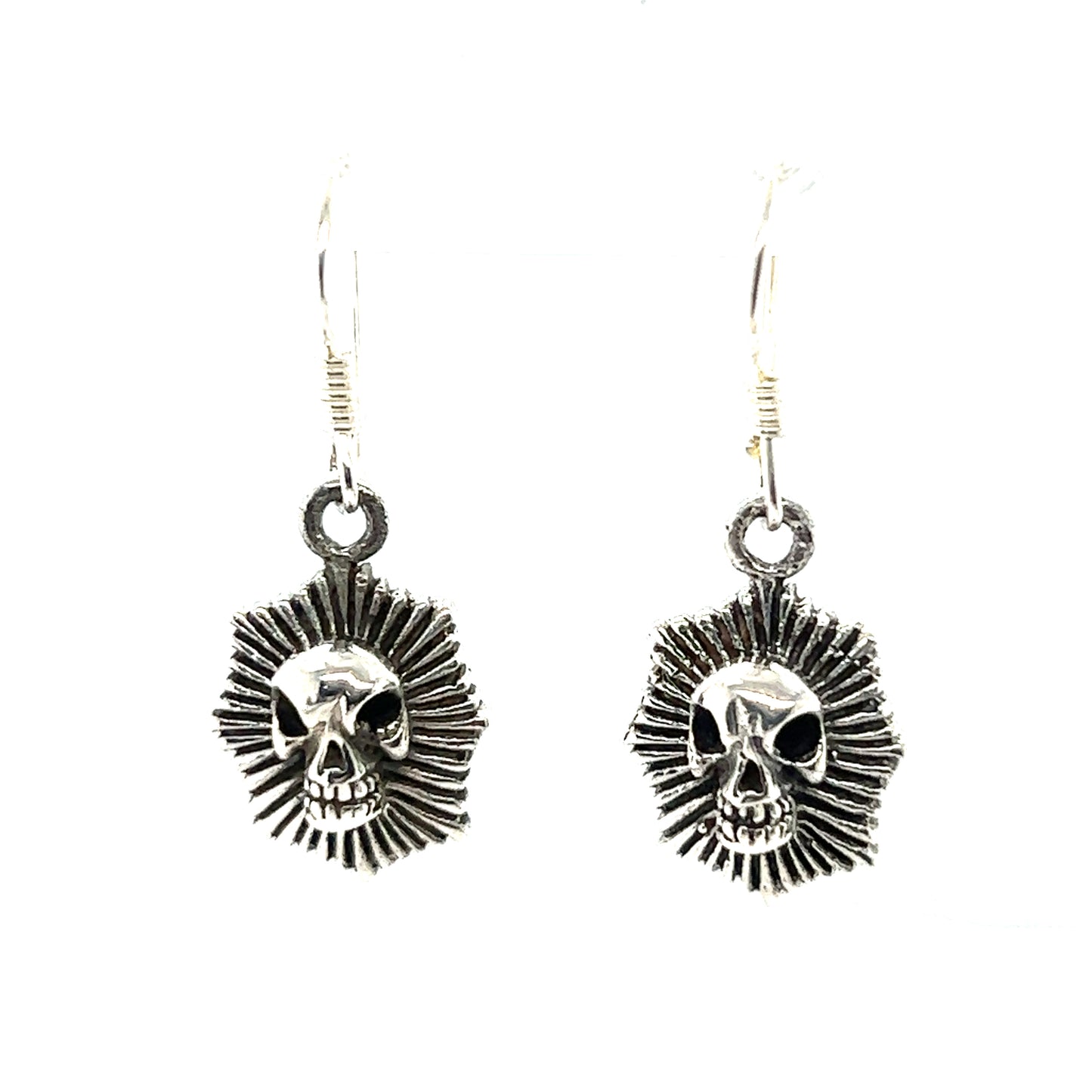 
                  
                    These edgy and elegant Super Silver Radiant Skull Earrings feature a sunburst design, adding a touch of mystique to any outfit.
                  
                
