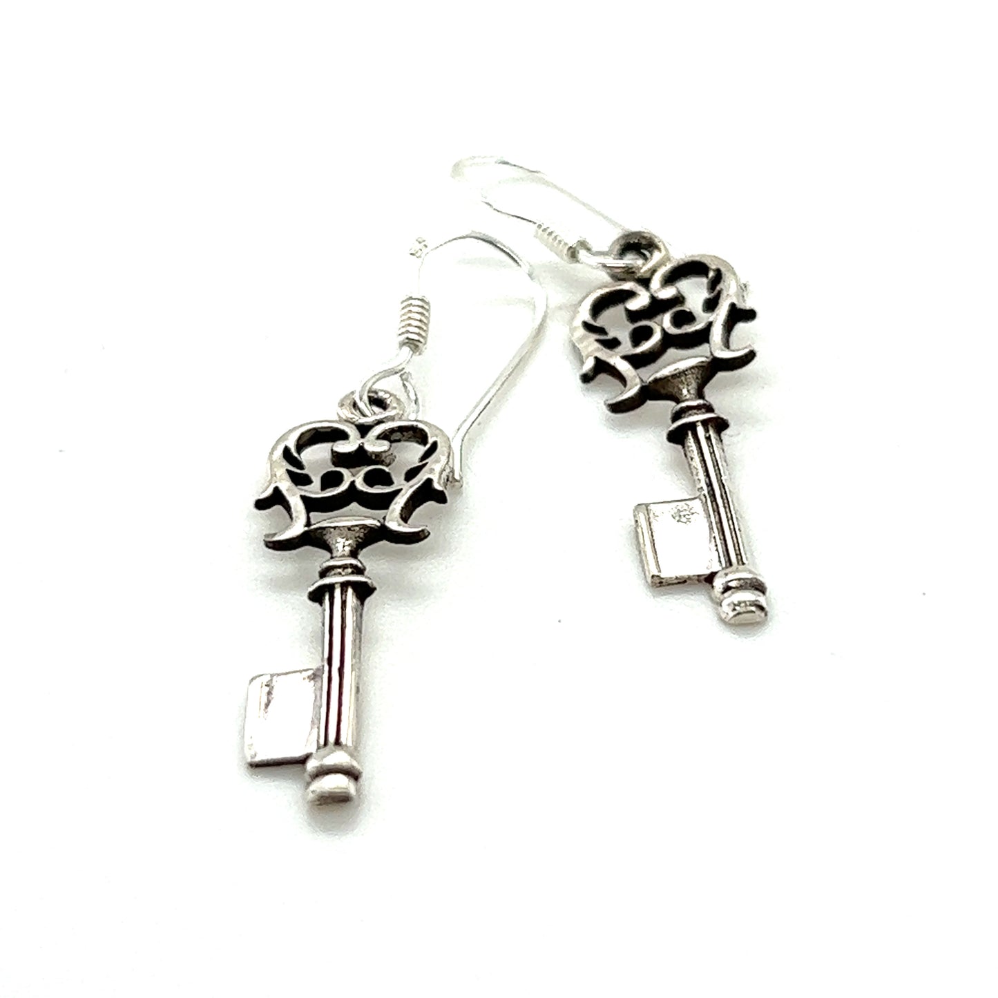 A pair of unique Super Silver .925 sterling silver Skeleton Key Earrings on a white background.