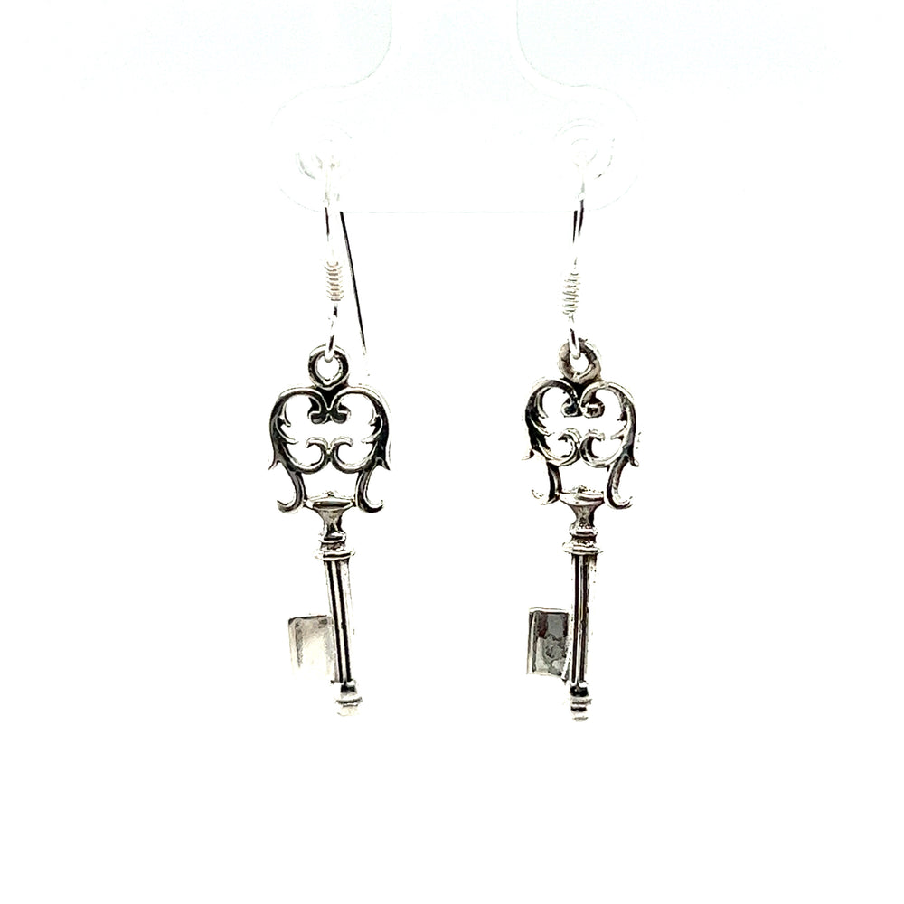 
                  
                    A pair of unique Super Silver Skeleton Key Earrings on a white background.
                  
                
