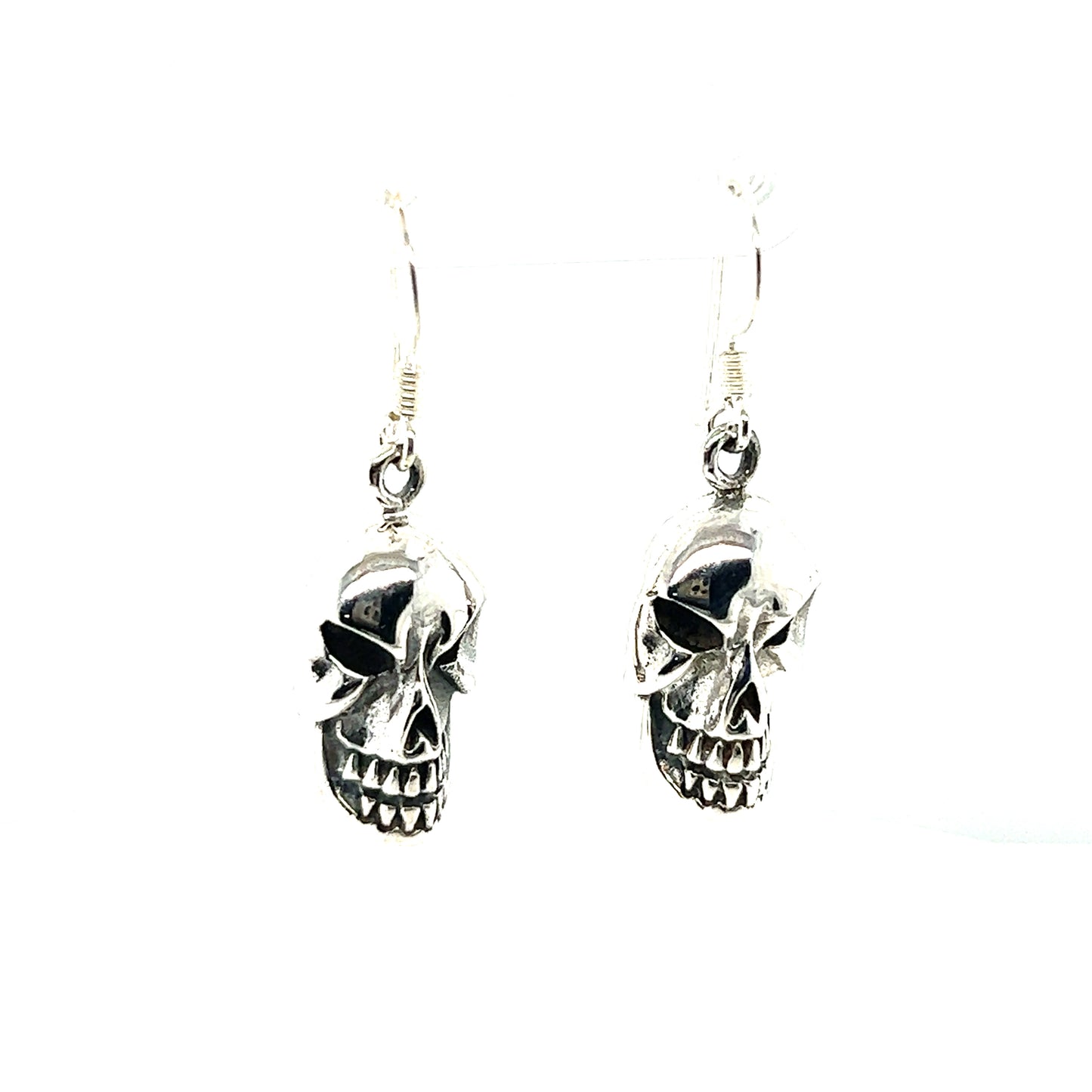 
                  
                    A pair of Super Silver Skull Earrings on a white background.
                  
                
