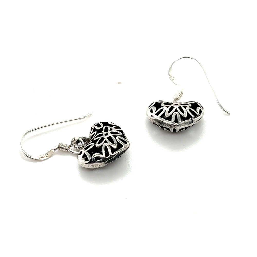 A pair of Super Silver Floral Open Heart Earrings with a vintage-inspired design on a white background.