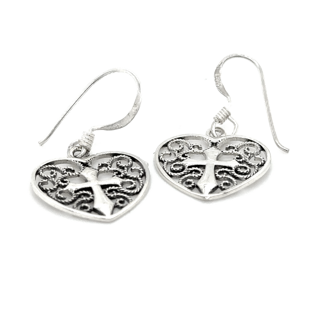 A pair of open Super Silver Filigree Heart with Cross Earrings in sterling silver.