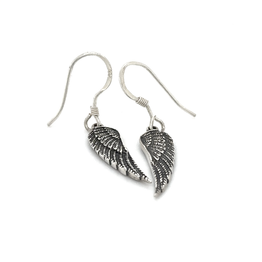 
                  
                    A pair of Super Silver Dainty Wing Earrings made of .925 Sterling Silver, showcased on a white background.
                  
                