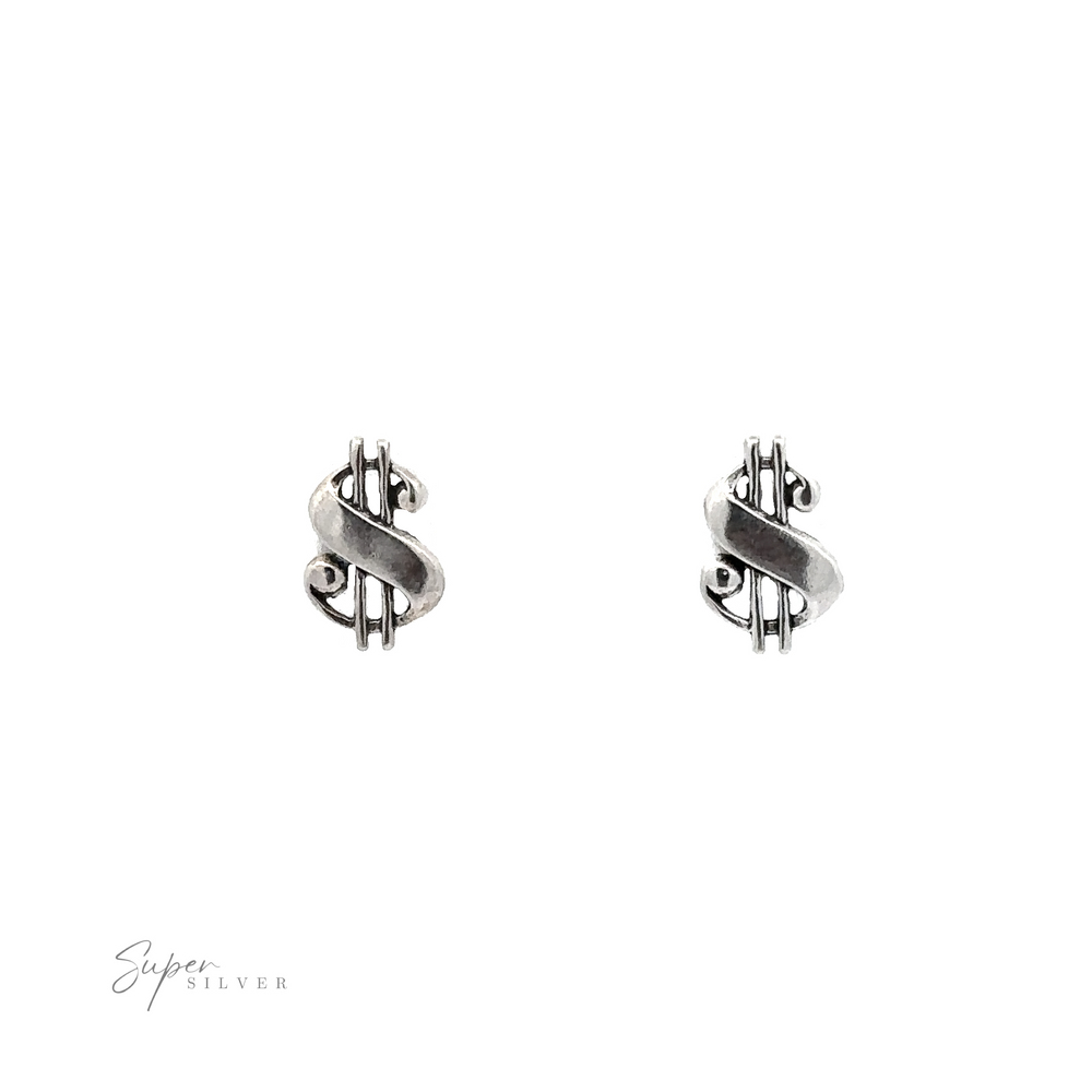 A pair of Dollar Sign Studs on a white background, symbolizing financial luck and style.