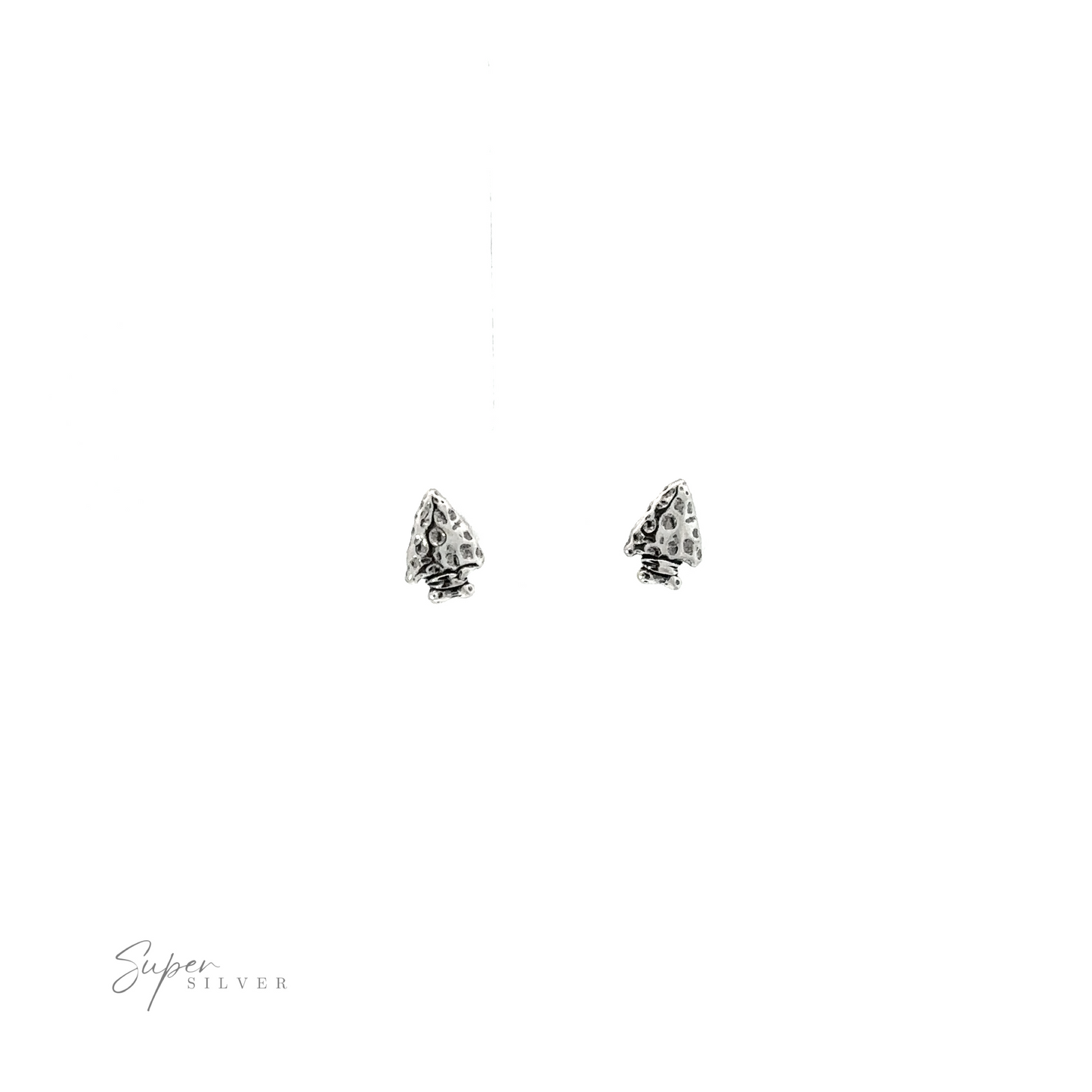 
                  
                    A pair of Arrowhead Studs featuring arrowhead studs with a detailed texture, showcased on a white background.
                  
                