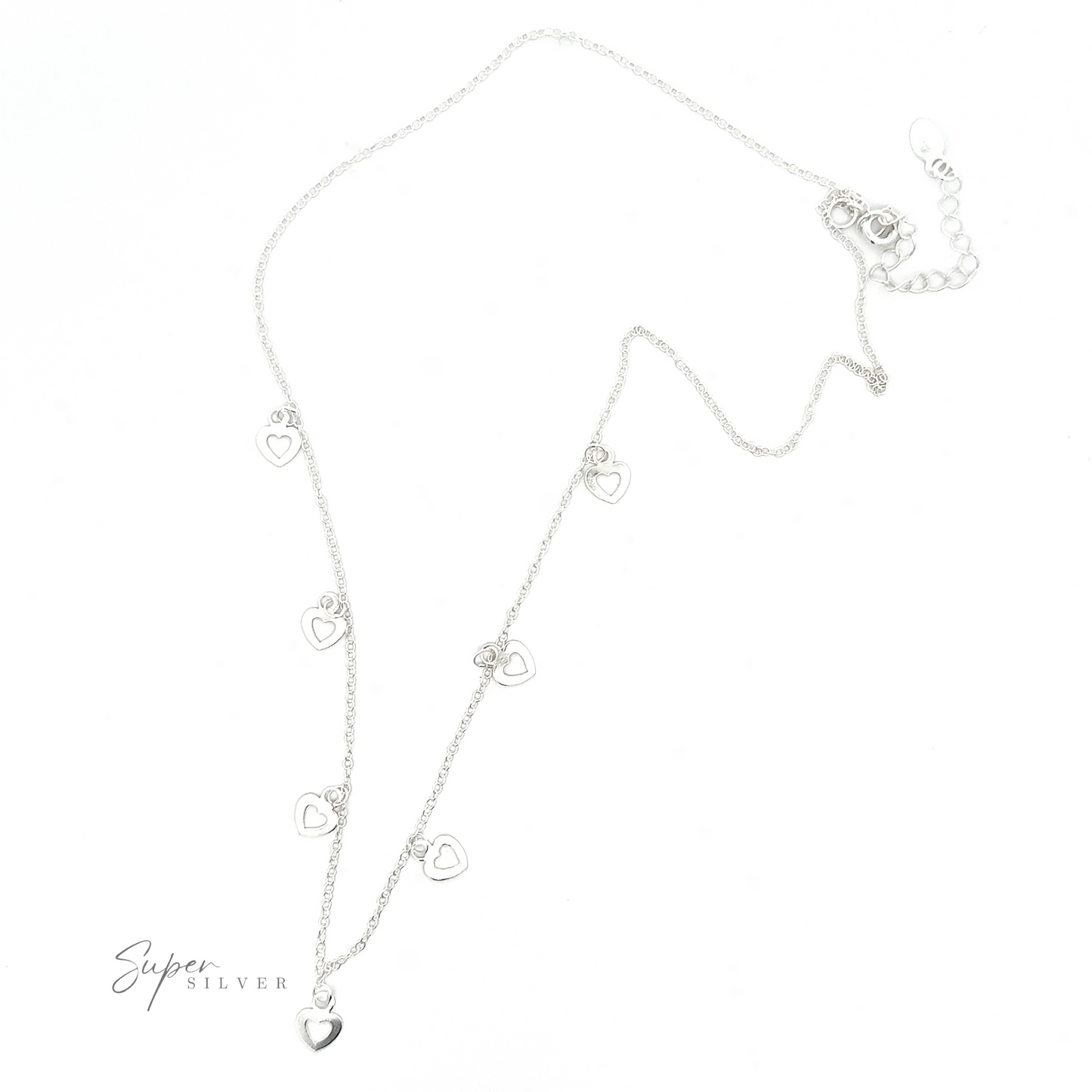 
                  
                    A Silver Open Heart Charm Necklace featuring heart-shaped pendants arranged at intervals along the chain and a small tag reading "Super Silver.
                  
                