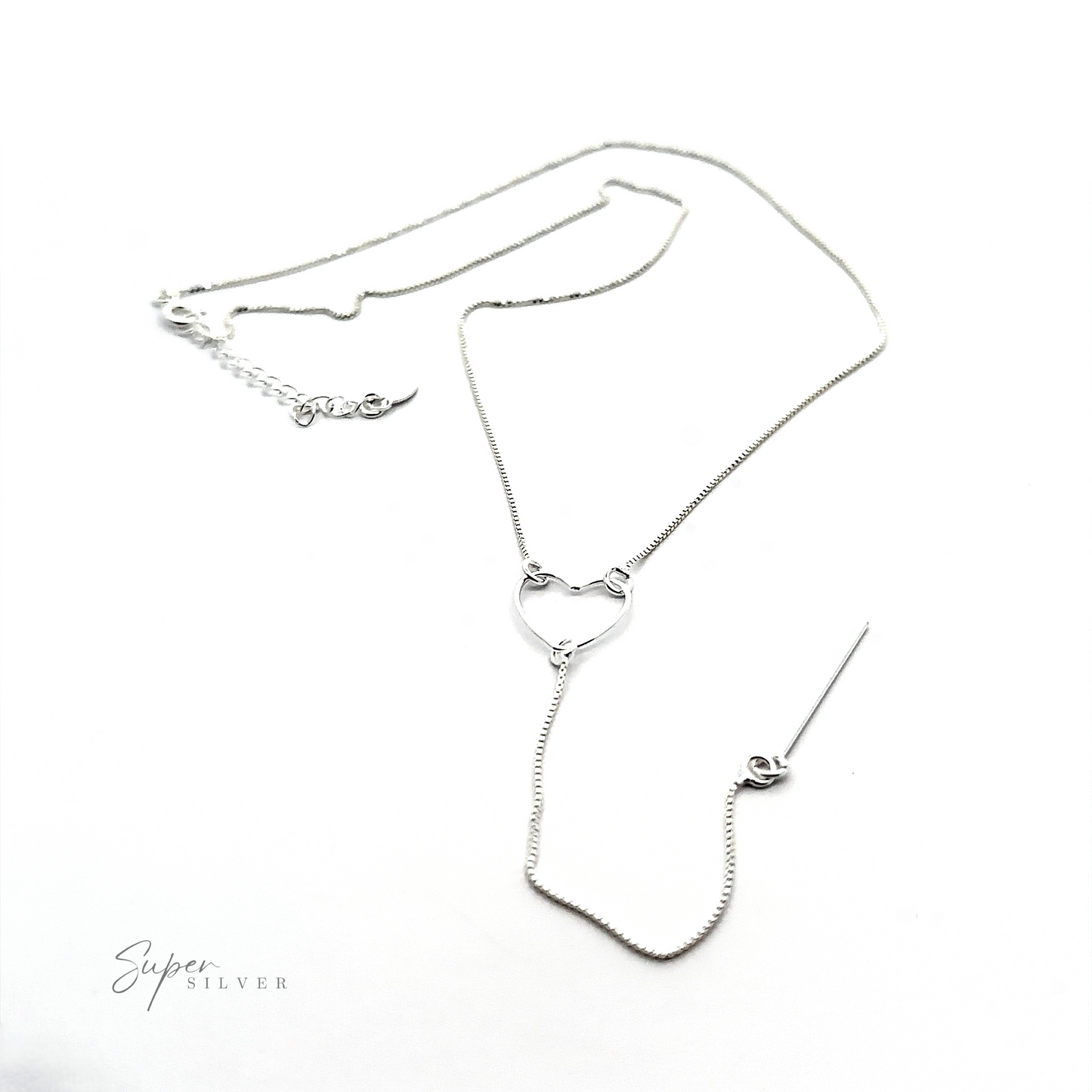 A sterling silver necklace with a small heart-shaped pendant and a slender chain, displayed against a white background. The chain also features an adjustable clasp. Text reads "Open Heart Lariat Necklace.