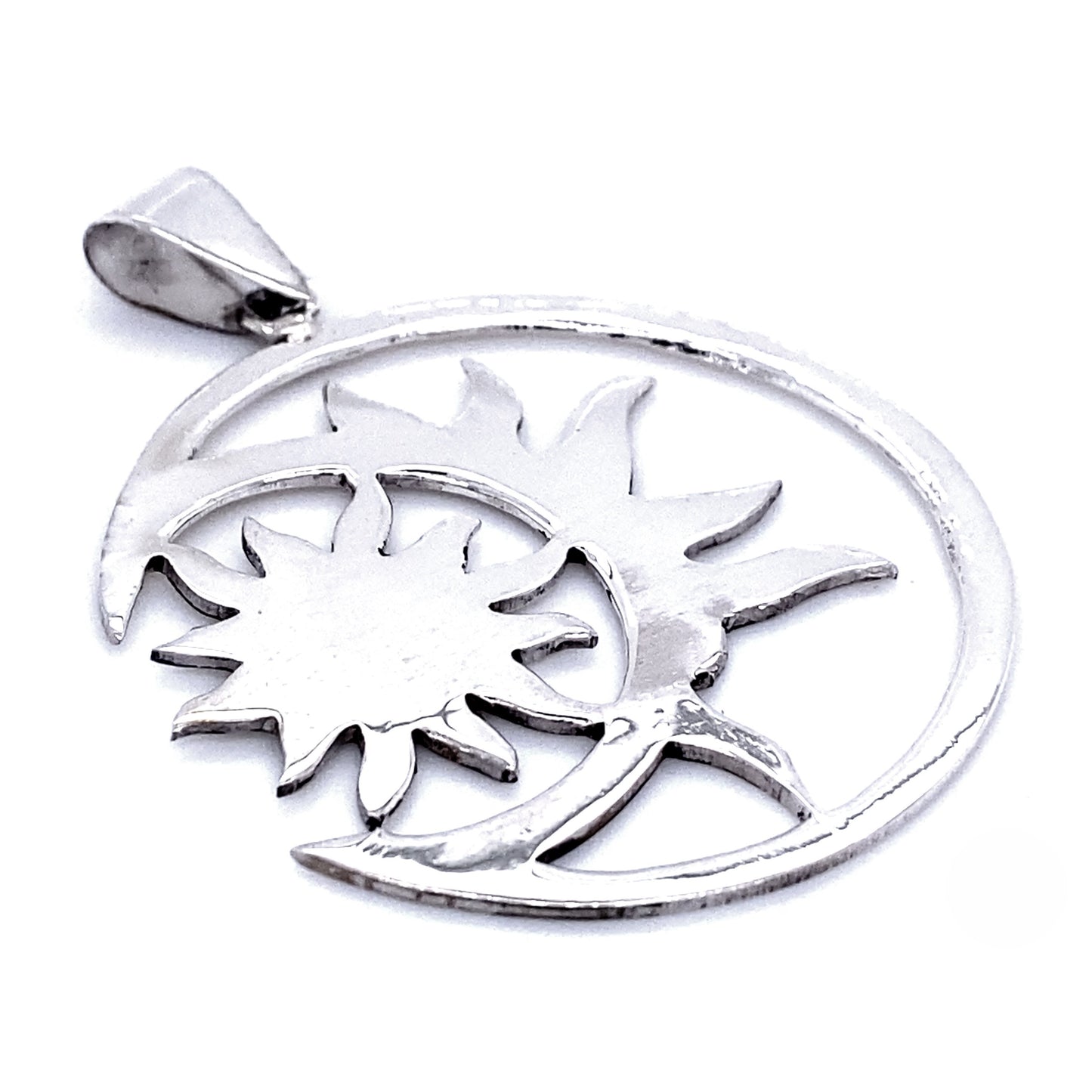 
                  
                    Brilliant Sun in Moon Pendant featuring a sun and moon design with intricate cutouts, beautifully capturing celestial bodies.
                  
                