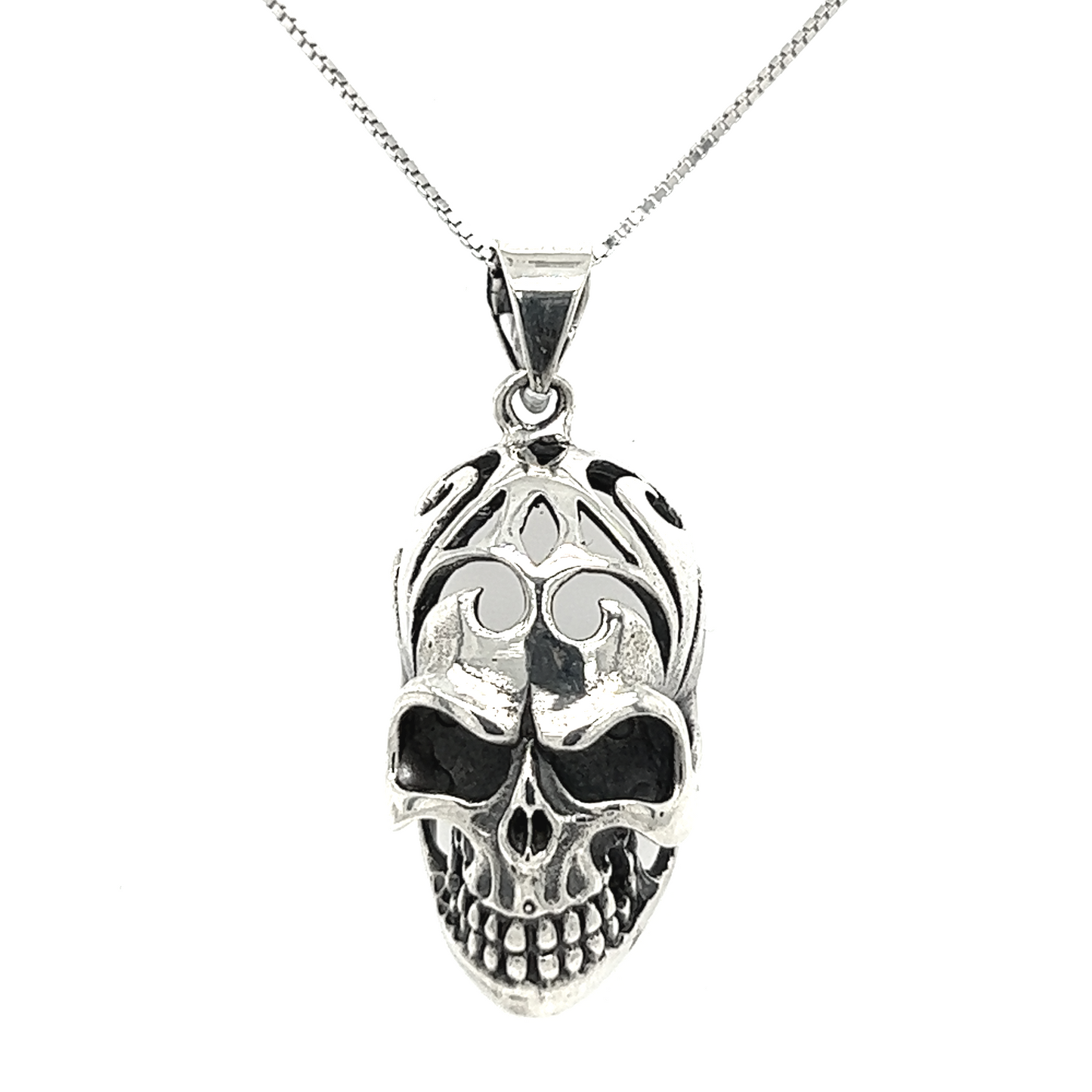 A distinctive Super Silver Skull Pendant with Swirl Design on a chain with an oxidized finish.
