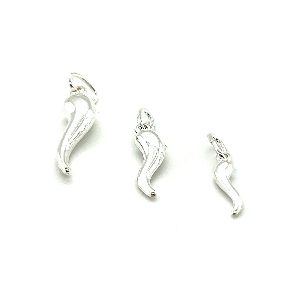 A charm collection of three Super Silver Italian Horn Charms, displayed on a white background.