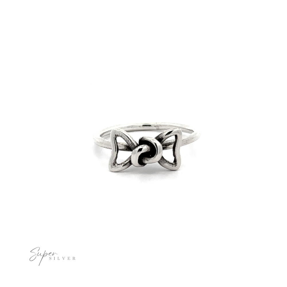 The Wire Bow Ring, a cute addition to any outfit, features a knotted center.