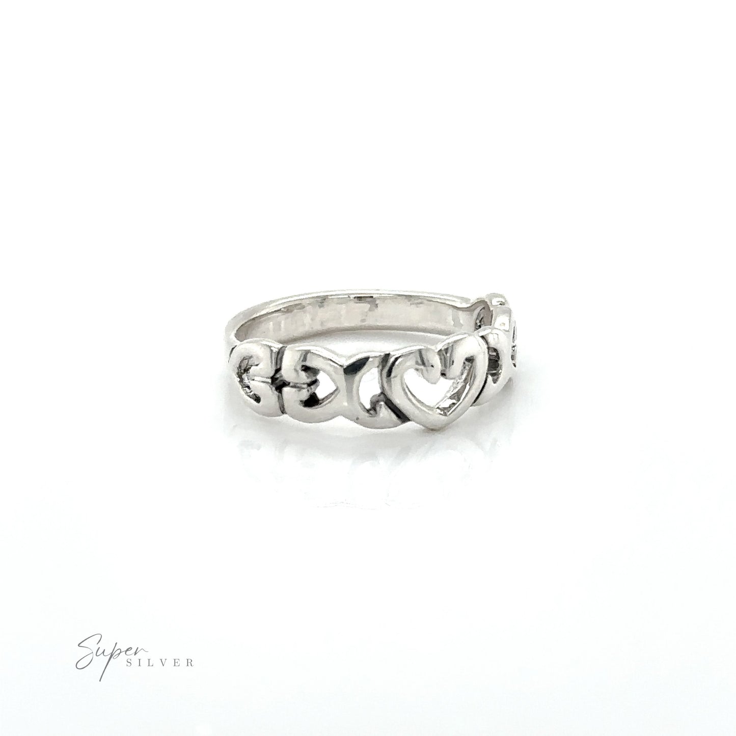 
                  
                    A sterling silver Open Heart Band Ring with a heart on it, symbolizing love.
                  
                