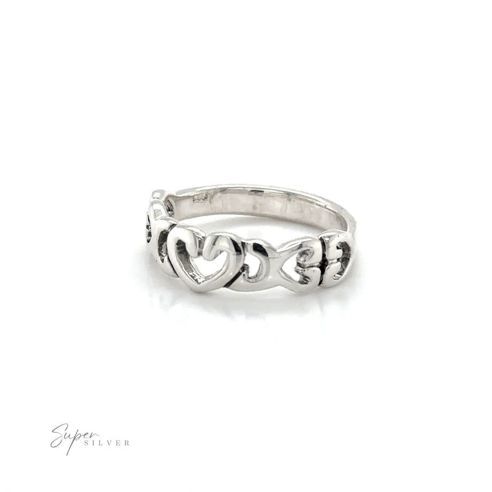 A sterling silver Open Heart Band Ring, symbolizing love.
