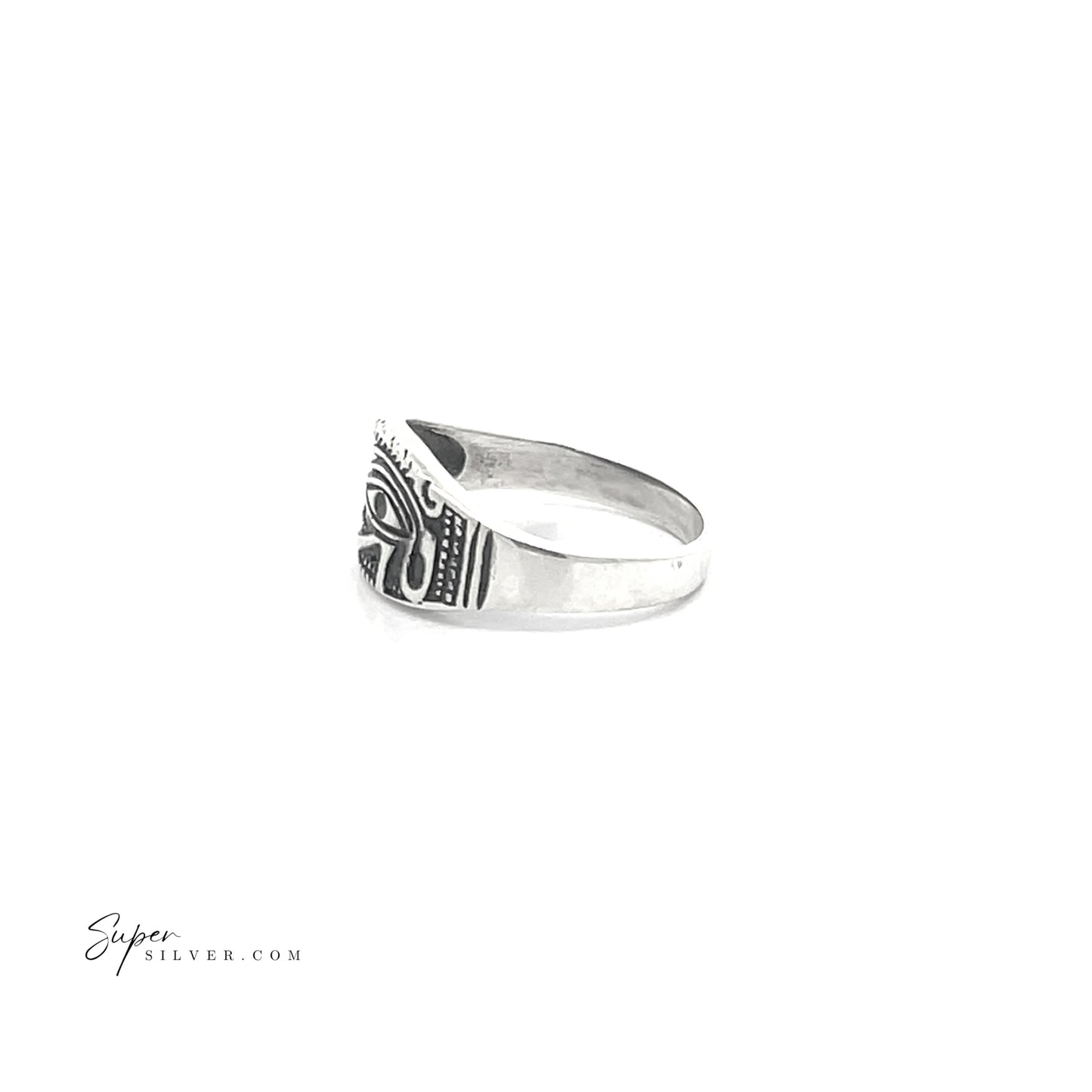 
                  
                    The side profile of the Eye of Ra Ring, crafted from sterling silver, features an intricate engraved pattern with an oxidized finish, beautifully set against a white backdrop.
                  
                