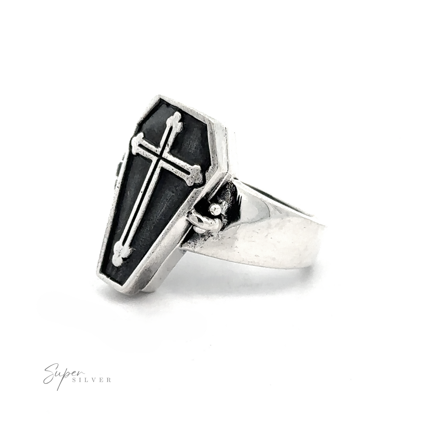 
                  
                    The Poison Coffin Ring with Cross exudes gothic elegance with its coffin-shaped top featuring a cross design. Made from .925 Sterling Silver, the brand name "Super Silver" is visible on the lower left corner, echoing timeless craftsmanship.
                  
                