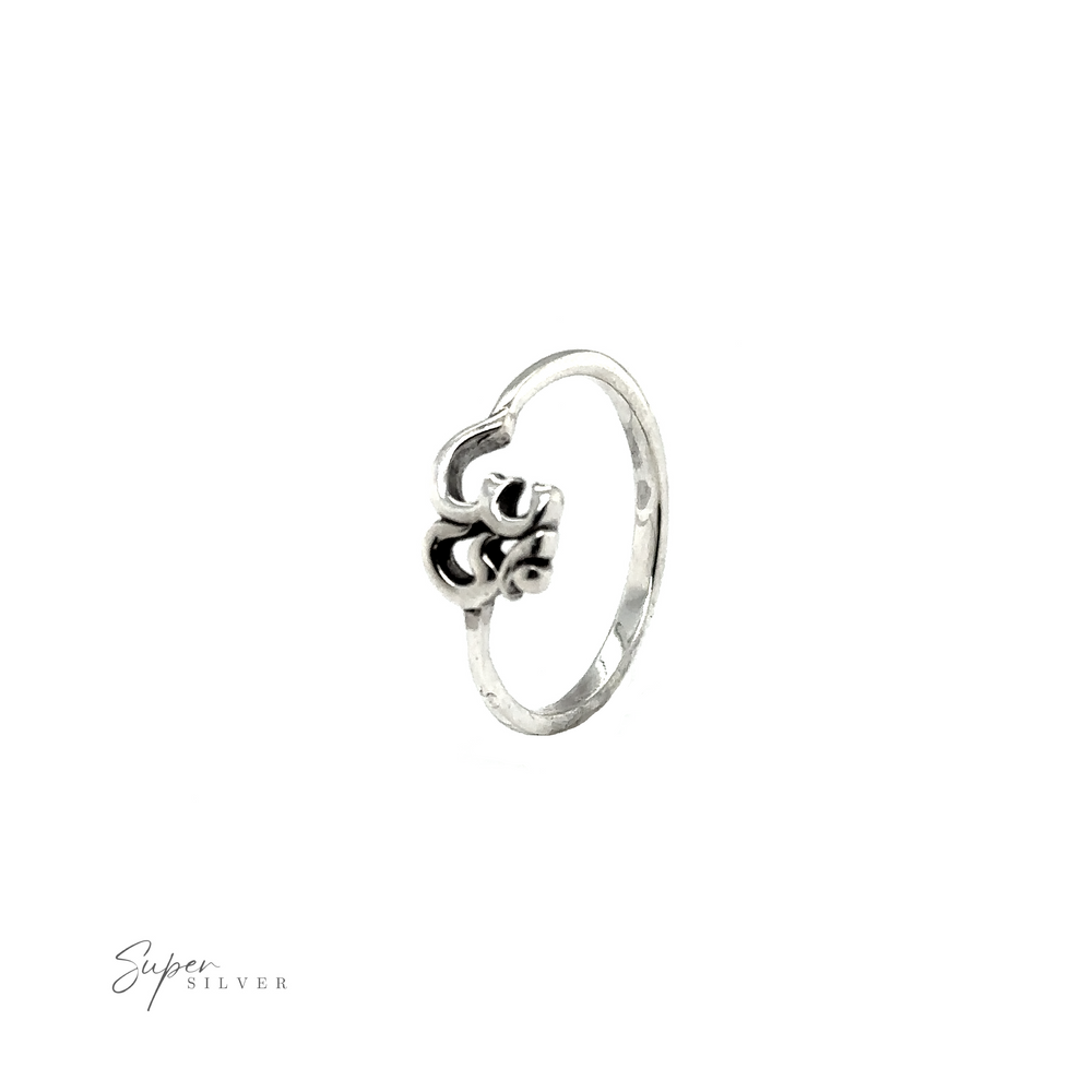 
                  
                    A Dainty Om Ring with a captivating flower design, symbolizing interconnectedness.
                  
                
