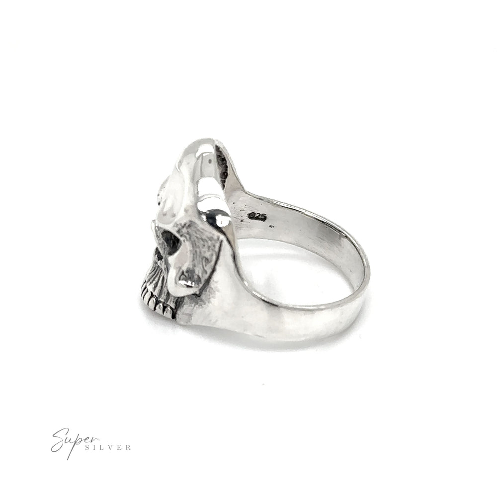 
                  
                    An angry Heavy Upper Skull Ring embodying a fearless spirit, showcased against a clean white background.
                  
                