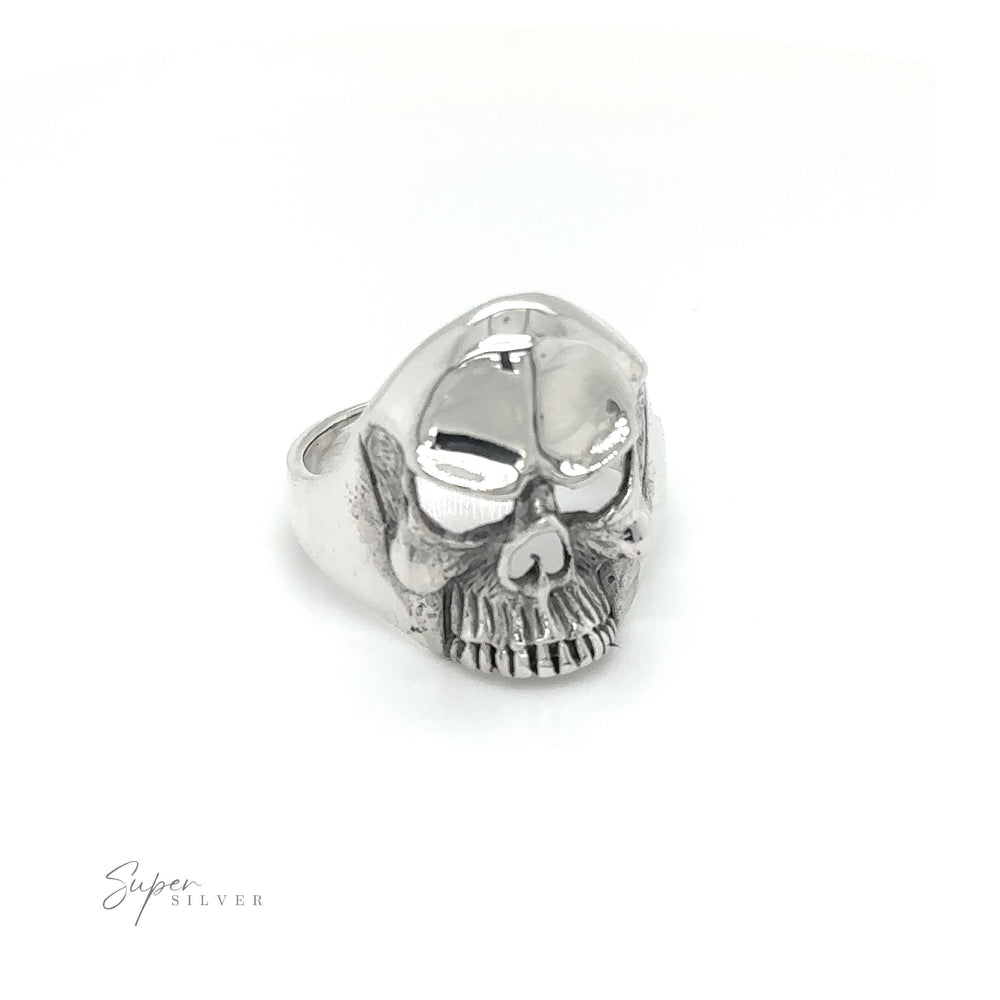 
                  
                    An angry Heavy Upper Skull Ring boldly displayed on a white background, perfectly capturing the fearless spirit and edgy rock 'n' roll fashion.
                  
                