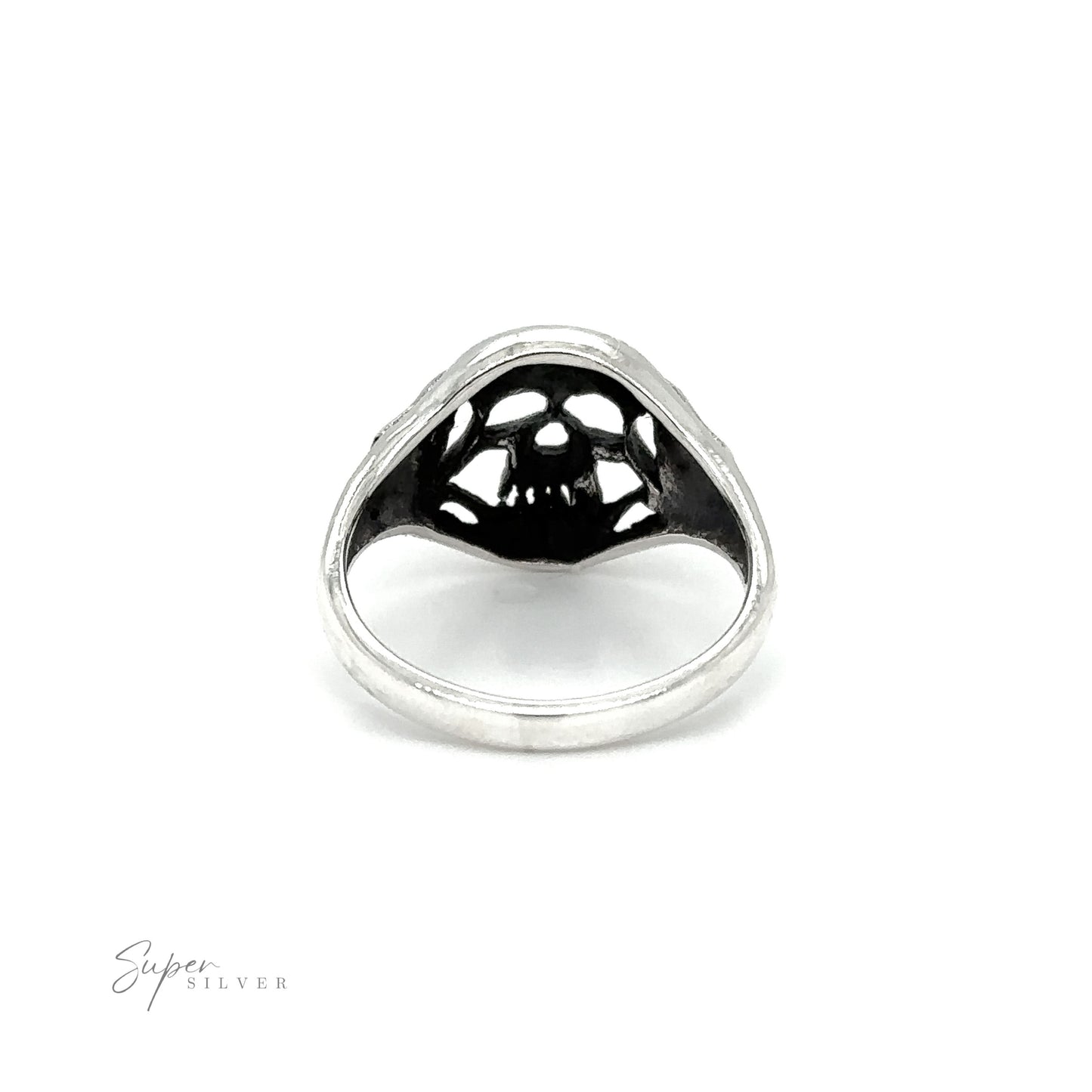 
                  
                    A gothic Smaller Skull Ring with black and white designs.
                  
                