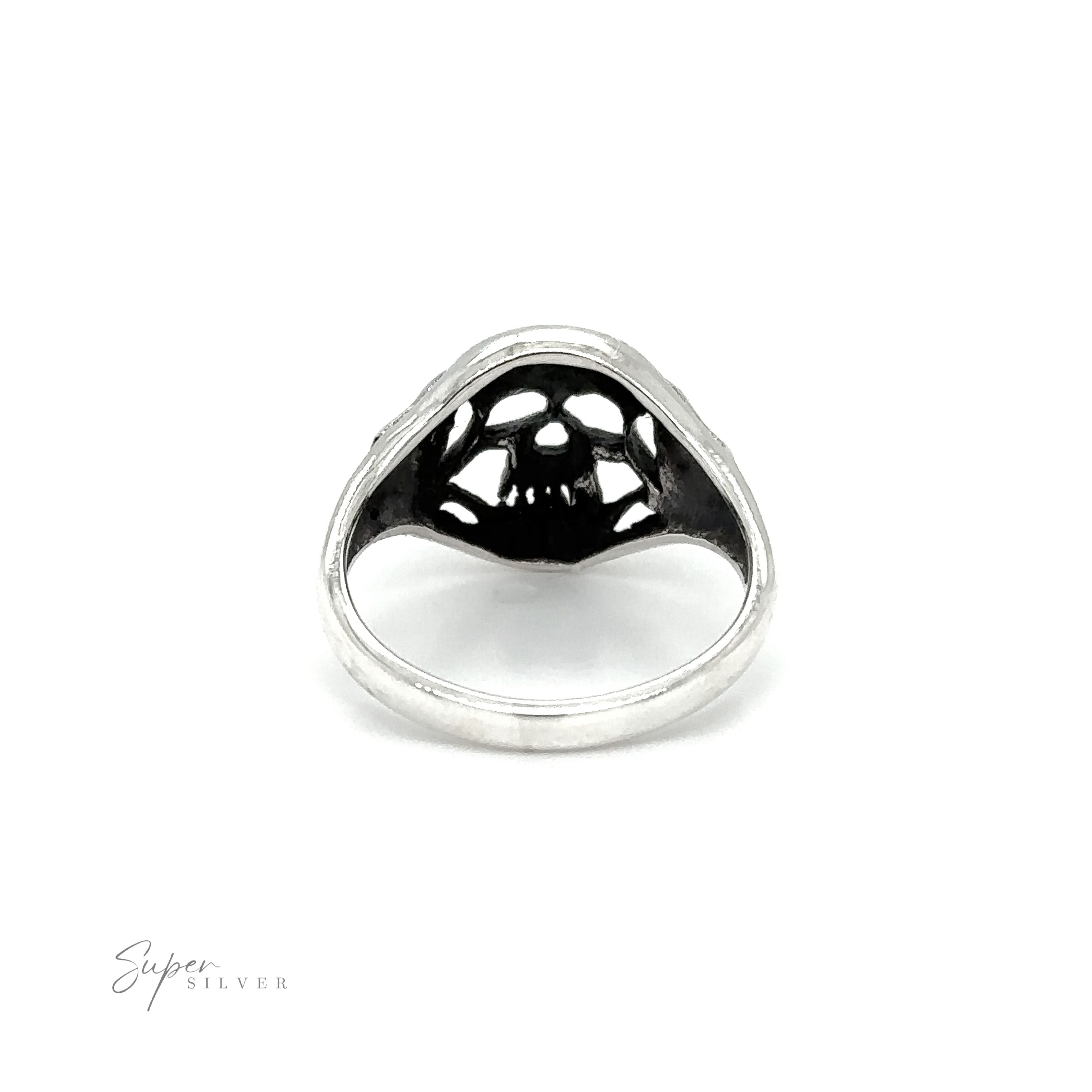 A gothic Smaller Skull Ring with black and white designs.