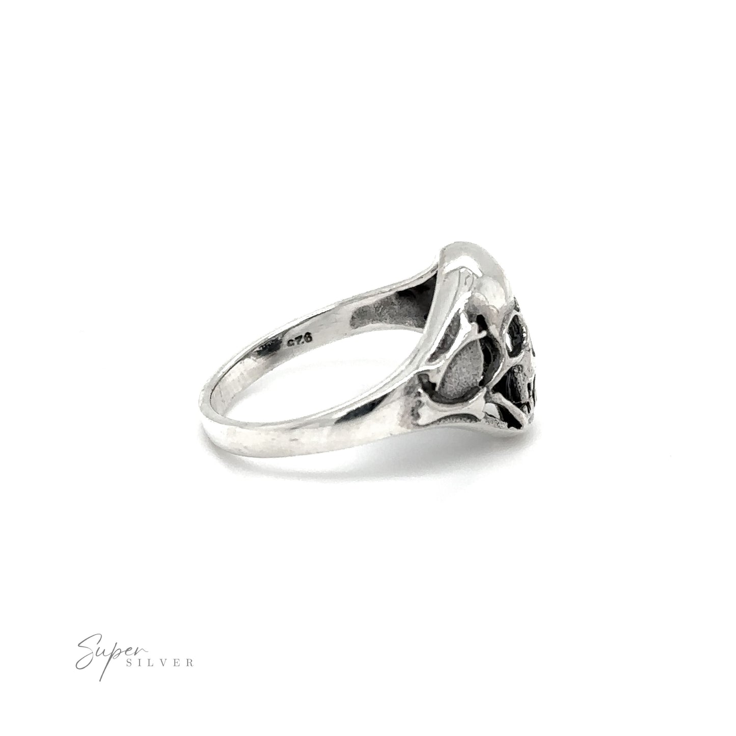 
                  
                    A gothic smaller skull ring on a white background.
                  
                