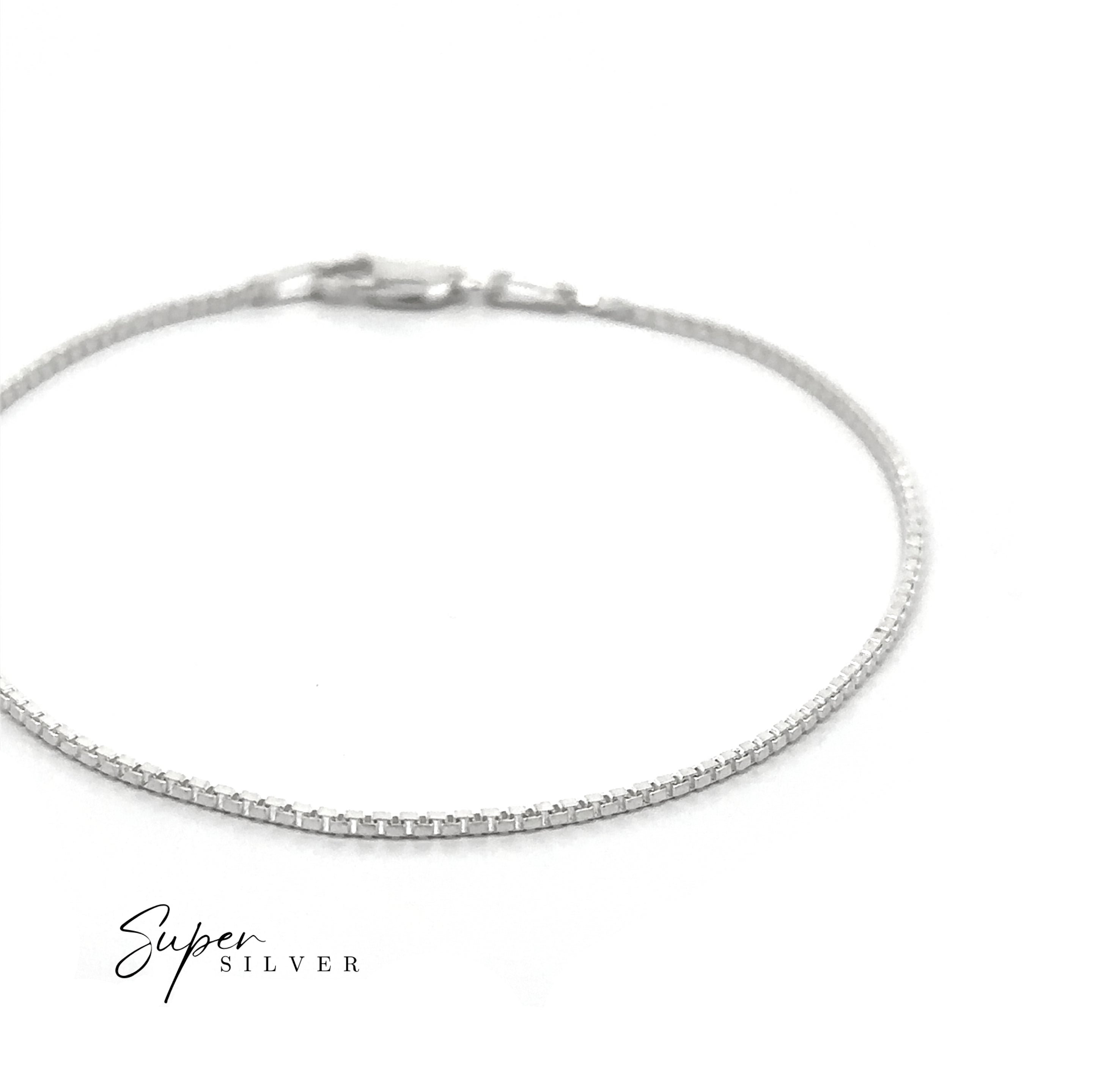 The Italian Edge Box Chain is a thin silver bracelet with a clasp, shown on a white background featuring the "Super Silver" logo in the corner.
