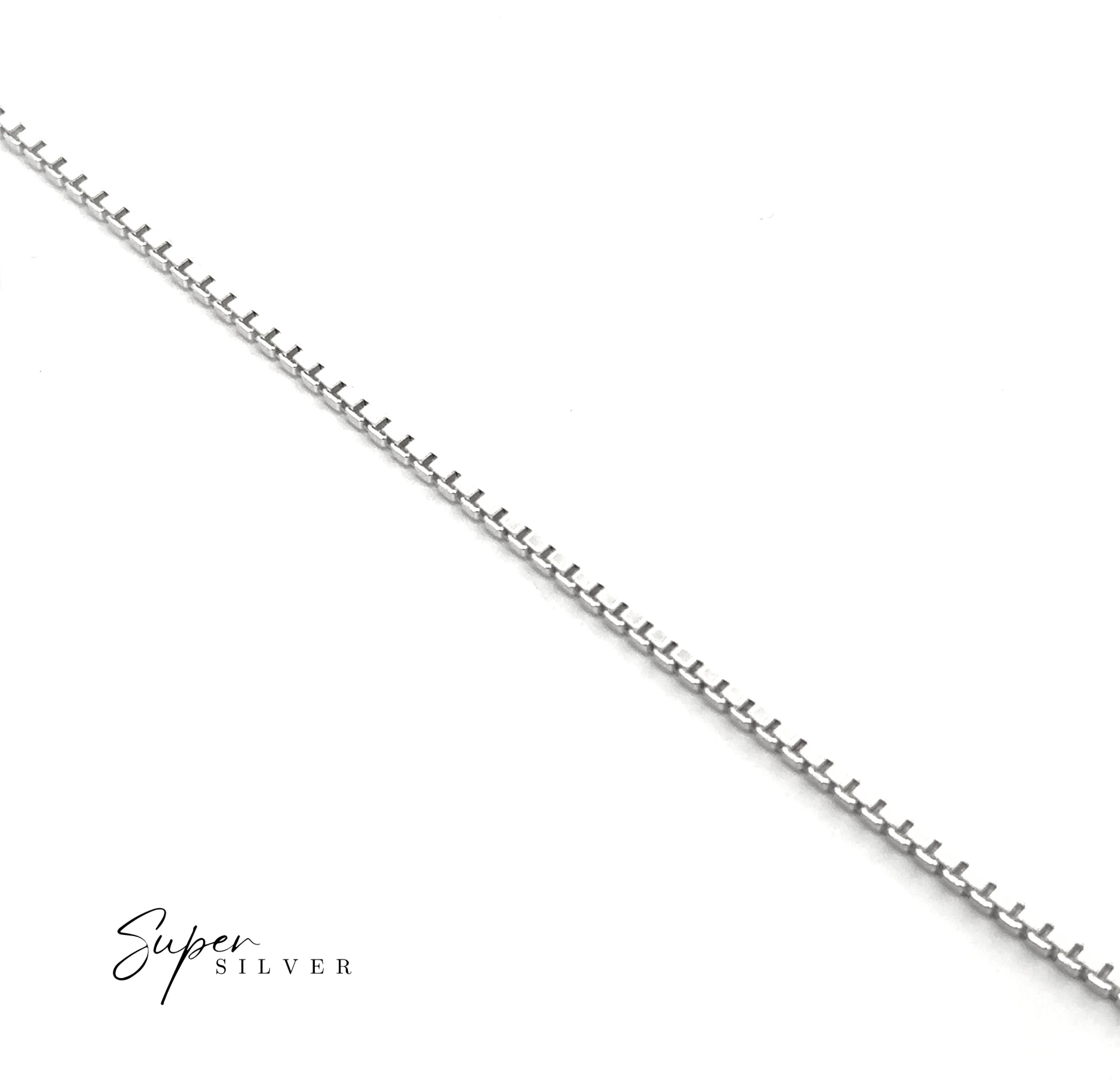 An Italian Edge Box Chain in sterling silver is laid diagonally on a white background, with "Italian Edge Box Chain" in the lower left corner.
