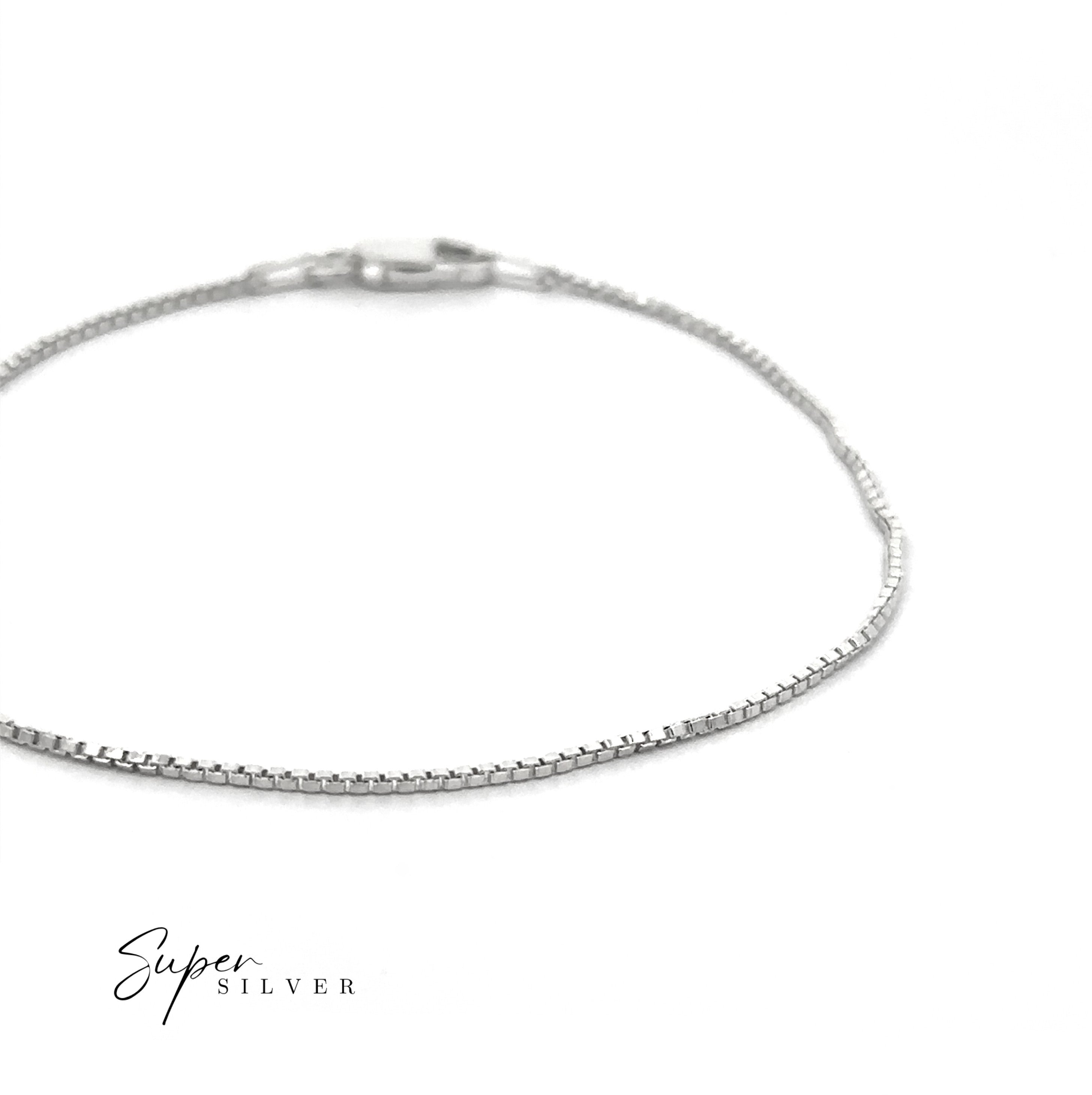 A Delicate Sterling Silver D/C Box Chain bracelet with a lobster clasp is shown on a white background, featuring the "Super Silver" logo in the bottom left and highlighting exceptional Italian craftsmanship.