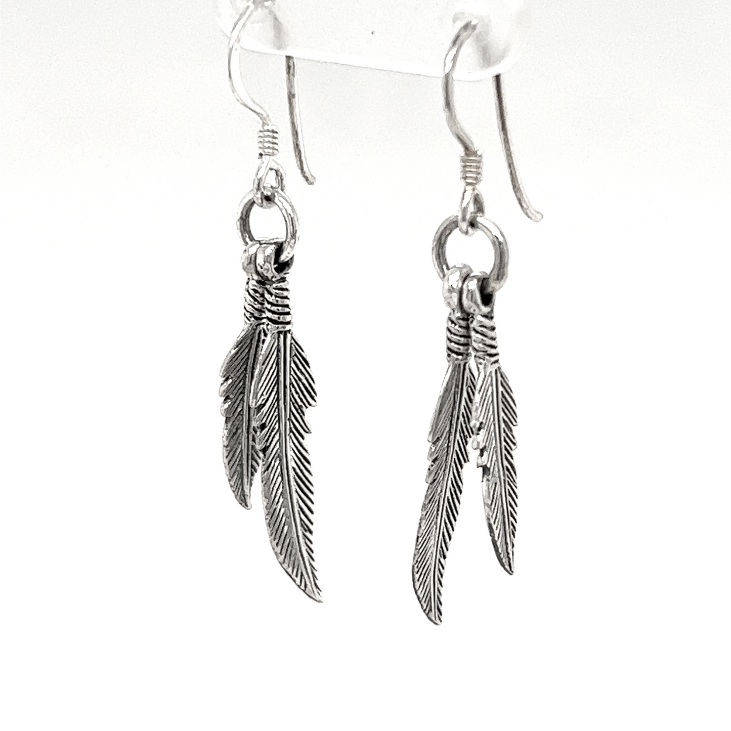 
                  
                    A pair of Super Silver Double Feather Earrings with french hooks.
                  
                