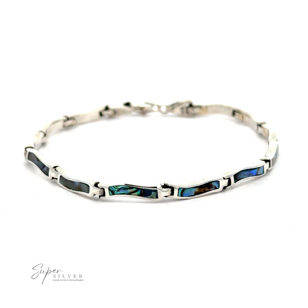 An Inlay Stone Curved Shaped Bracelet with rectangular segments adorned with abalone shell and featuring a clasp closure. The bracelet, showcased against a white background, shimmers with the iridescence unique to abalone.