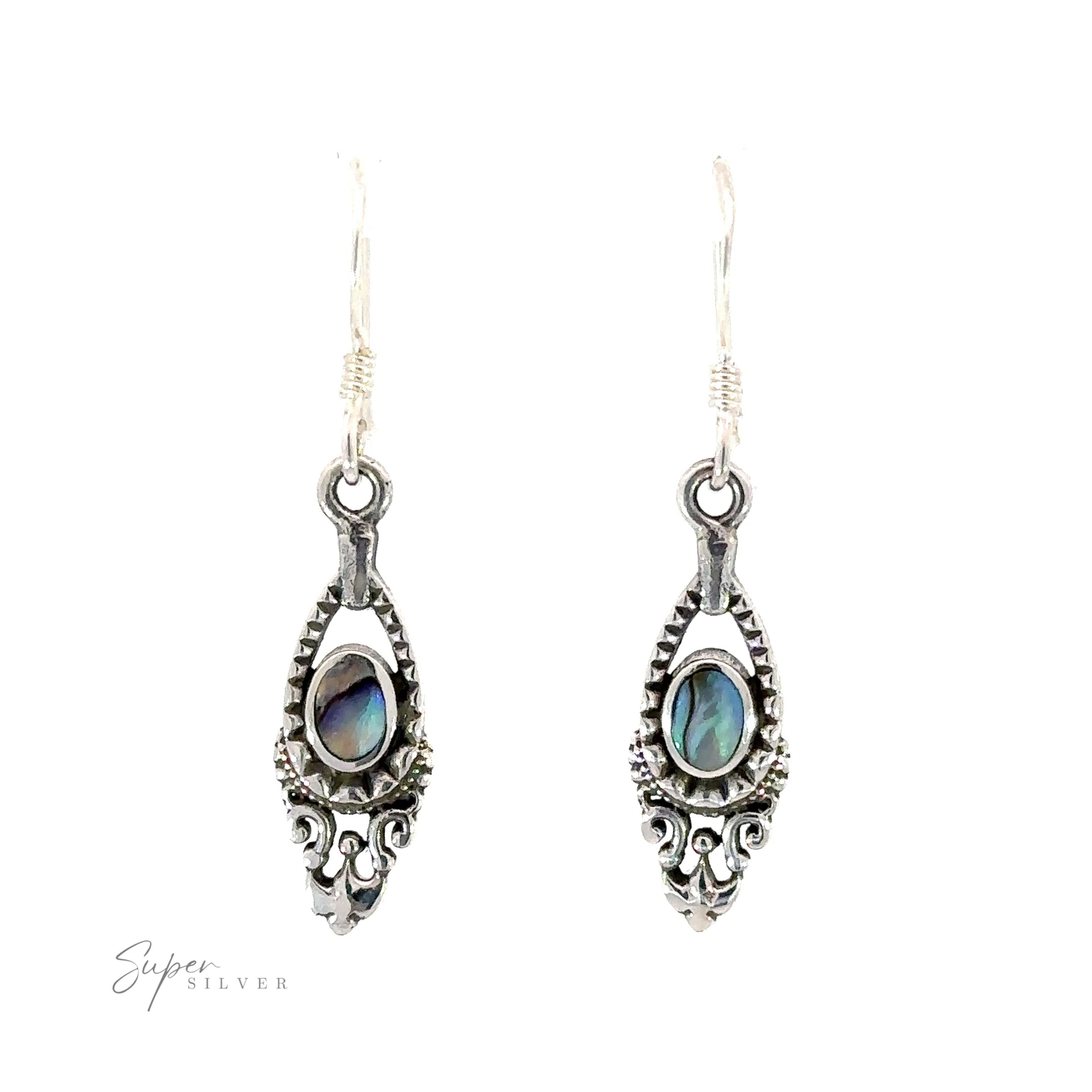 A pair of small Delicate Victorian Stone Earrings with a black abalone shell, perfect for everyday wear.