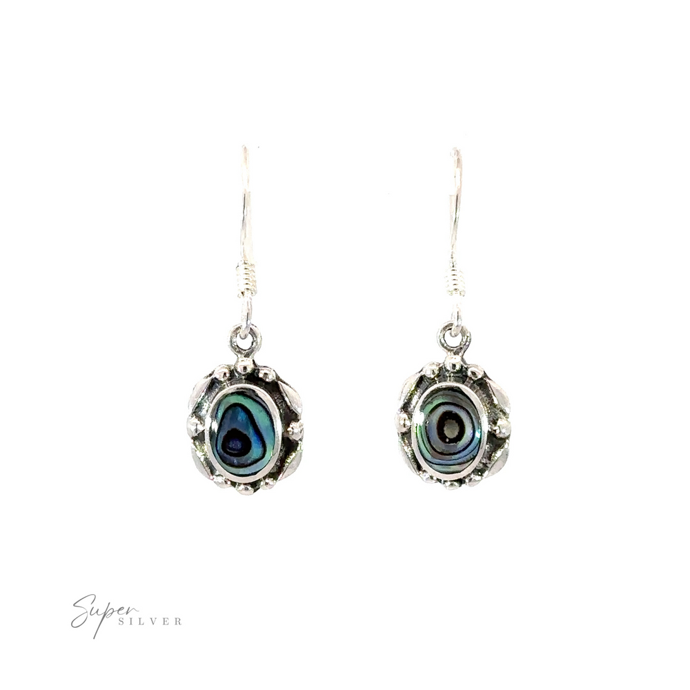 
                  
                    A pair of sterling silver Oval Inlaid Stone Earrings with an inlaid abalone shell.
                  
                