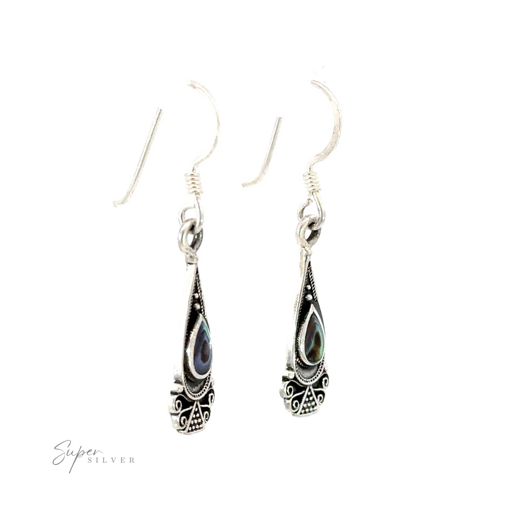 
                  
                    Bali Inspired Teardrop Shaped Earrings With Inlay Stones with abalone shell, perfect for a touch of Bali charm.
                  
                
