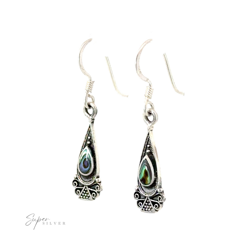 
                  
                    These sterling silver earrings feature abalone shells inlaid within a dainty teardrop design. Handcrafted in Bali.
                  
                