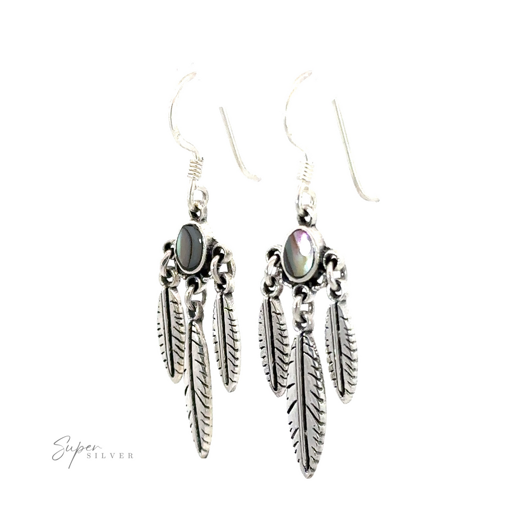 
                  
                    A pair of Western Inspired Earrings with Feather Dangles and Inlay Stones.
                  
                
