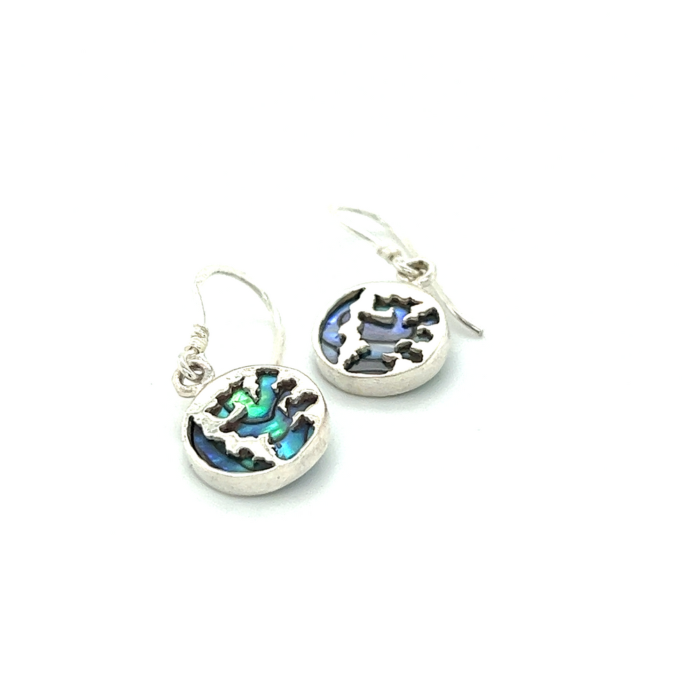 
                  
                    A pair of beautiful Super Silver Round Abalone Earrings with Overlay Design.
                  
                