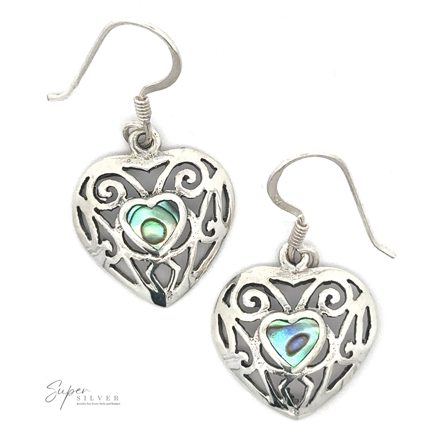 Heart-shaped sterling silver earrings with intricate designs and a small green and purple abalone shell in the center. Elegant Heart Shaped Abalone Earrings branding is visible in the bottom left corner.