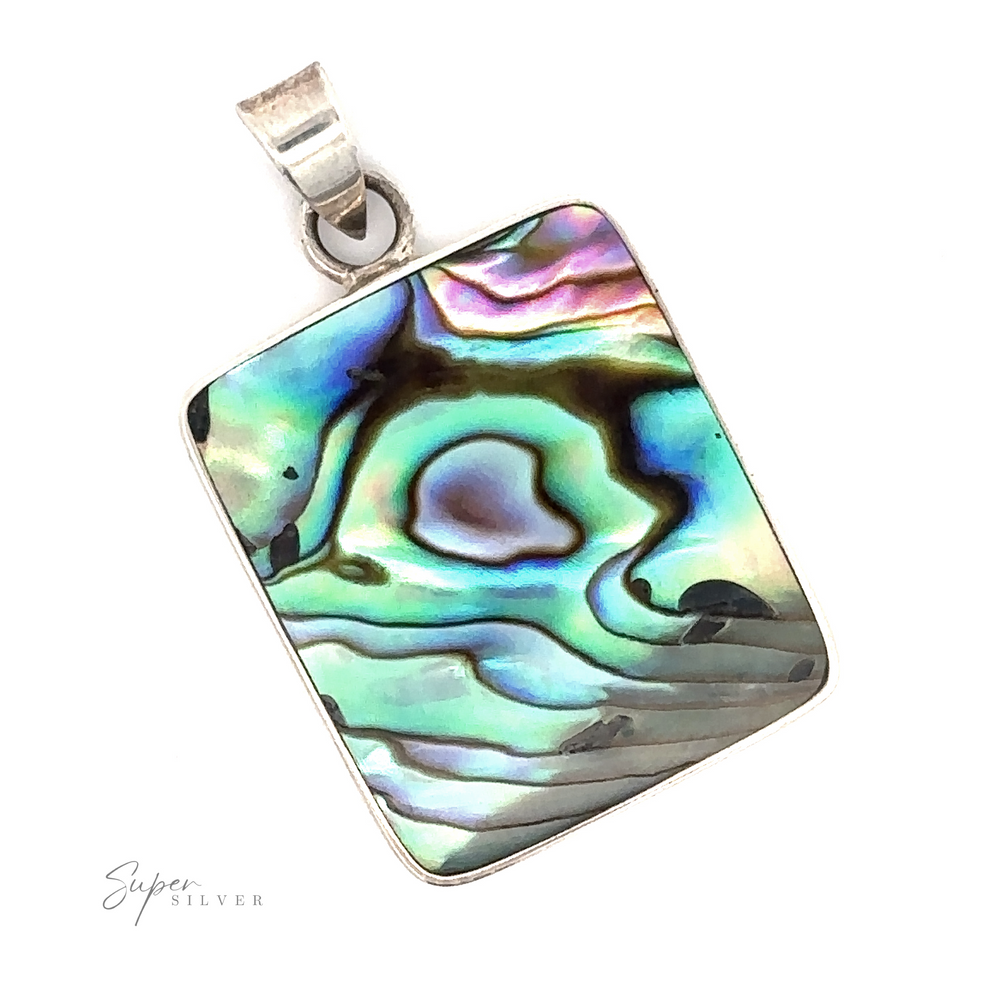 The Square Abalone Pendant showcases shimmering iridescent colors in a sterling silver setting, offering an air of coastal elegance.