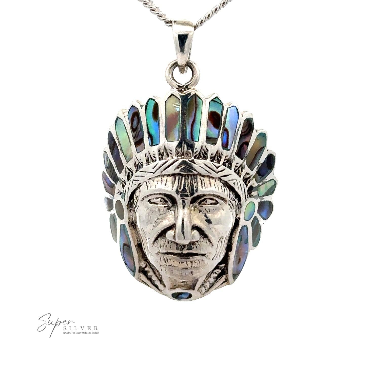 
                  
                    A Chief Pendant With Inlaid Stones featuring a detailed head of a Native American chief adorned with colorful inlaid stones.
                  
                